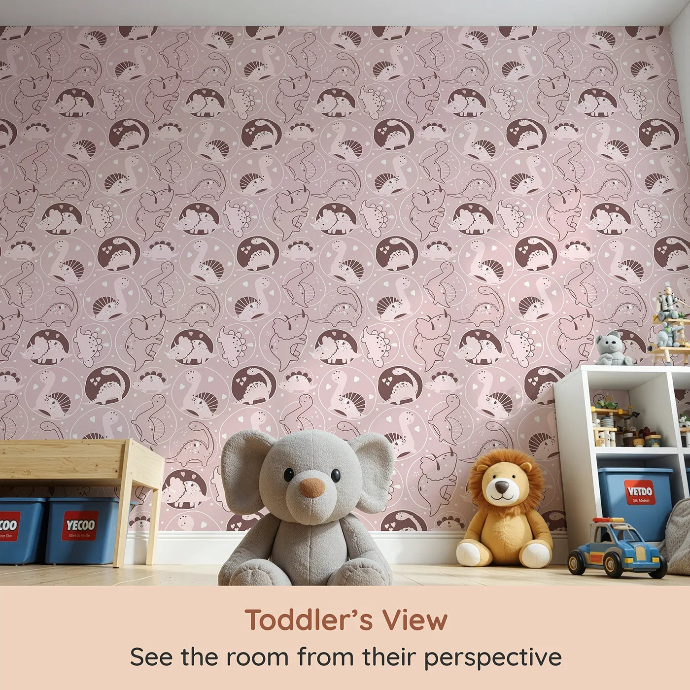 Whimsy Tots Dino Circle Parade Wallpaper in Blush Pink (W3079B) from your child's view.Sweet pink dinosaurs twirl in hearts and blossoms across a soft rosey field.