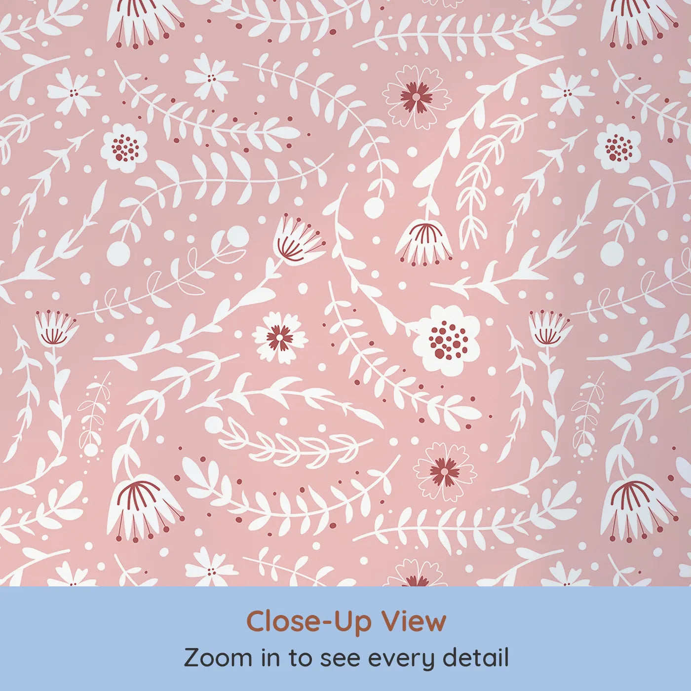 Close-up view of Whimsy Tots' Spring Meadow Whispers Wallpaper in Blush Pink (W3089A).White blooms and soft vines twirl gently across a rosy pink field.
