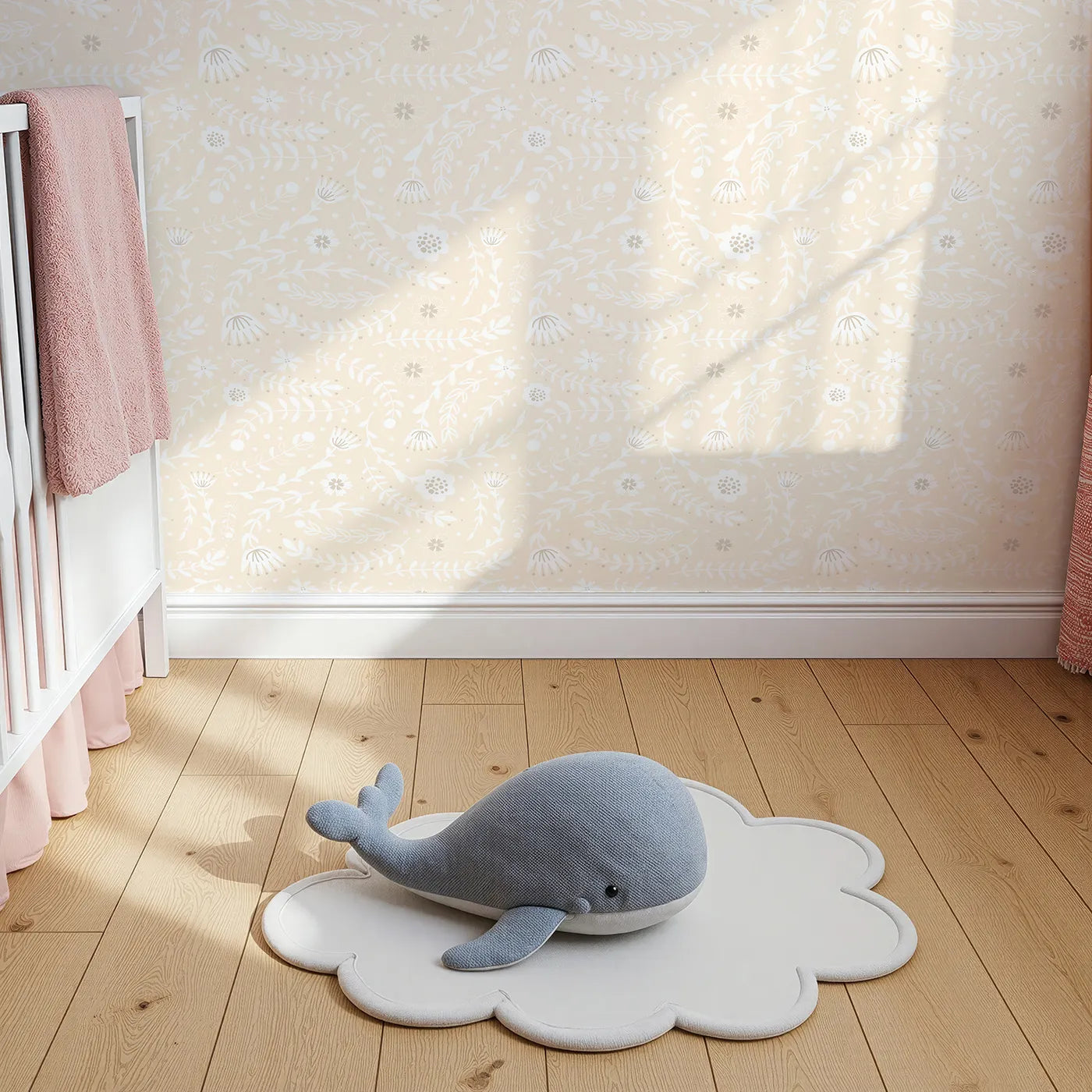 Top-Down view of Whimsy Tots' Spring Meadow Whispers Wallpaper in Peach Cream (W3089D).Gentle florals and floating leaves bathe in a warm peachy hue.