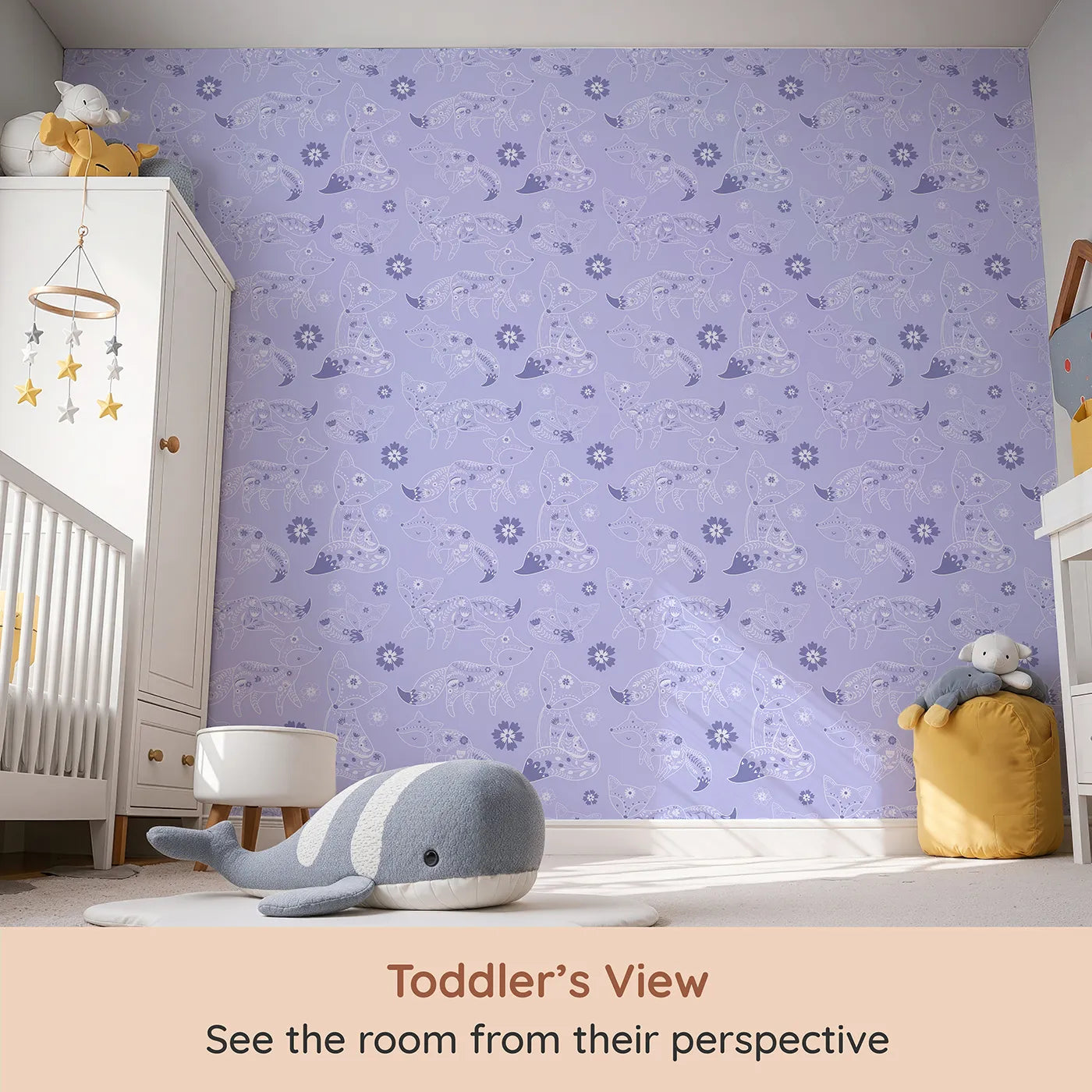 Whimsy Tots Floral Fox Cuddles Wallpaper in Lavender Mist (W3091E) from your child's view.Gentle foxes and violet blooms drift through a calming lavender dream.