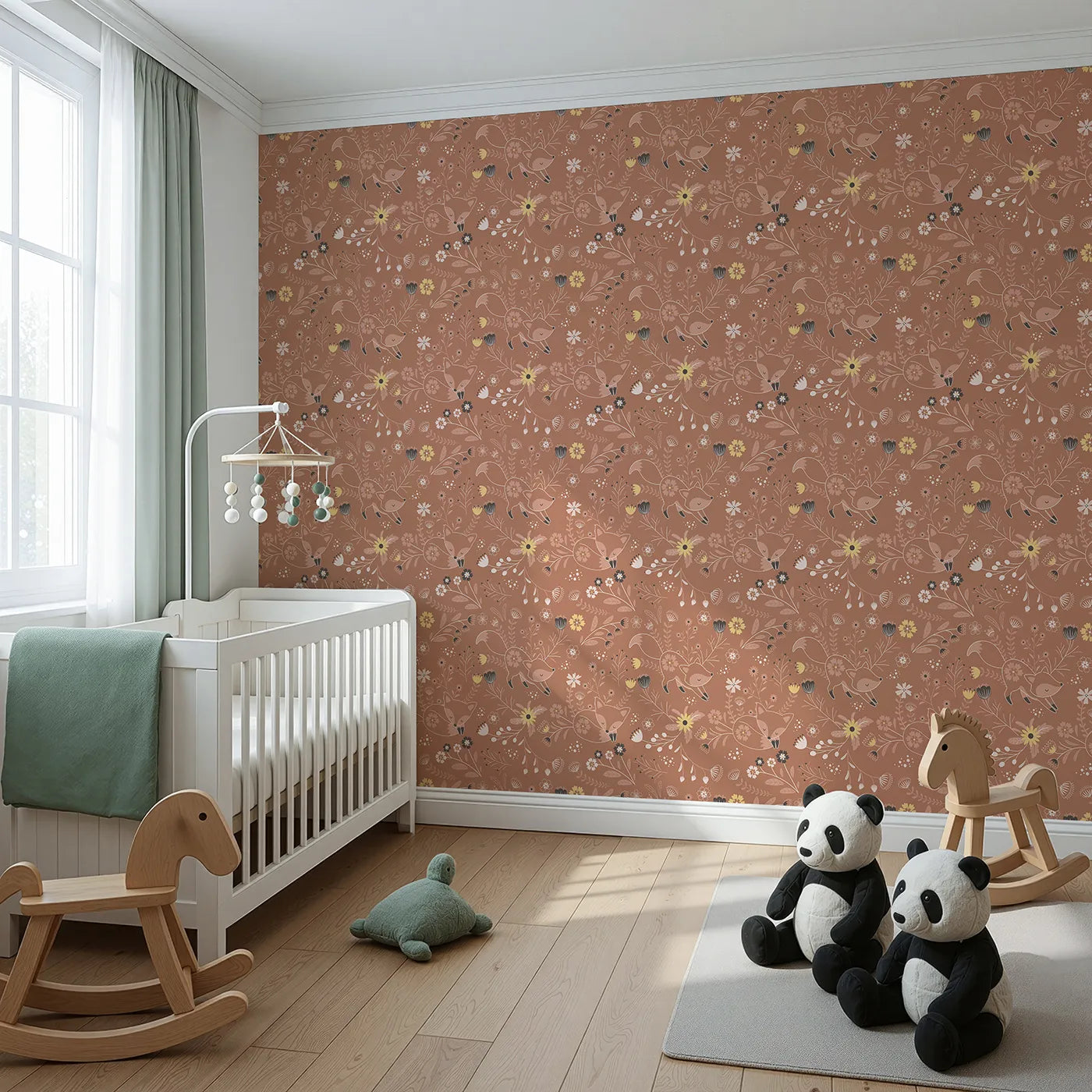 Angled view of Whimsy Tots' Wildflower Fox Dreams Wallpaper in Terracotta (W3095).Playful foxes stretch and snooze among blooming wildflowers.