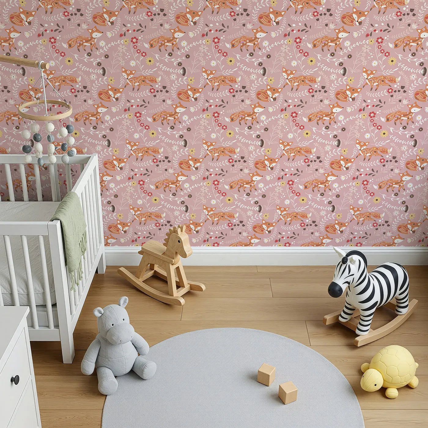 Top-Down view of Whimsy Tots' Folk Bloom Foxes Wallpaper in Rosewood Pink (W3096A).Dancing foxes and blooming vines twirl across a rosy pink forest.