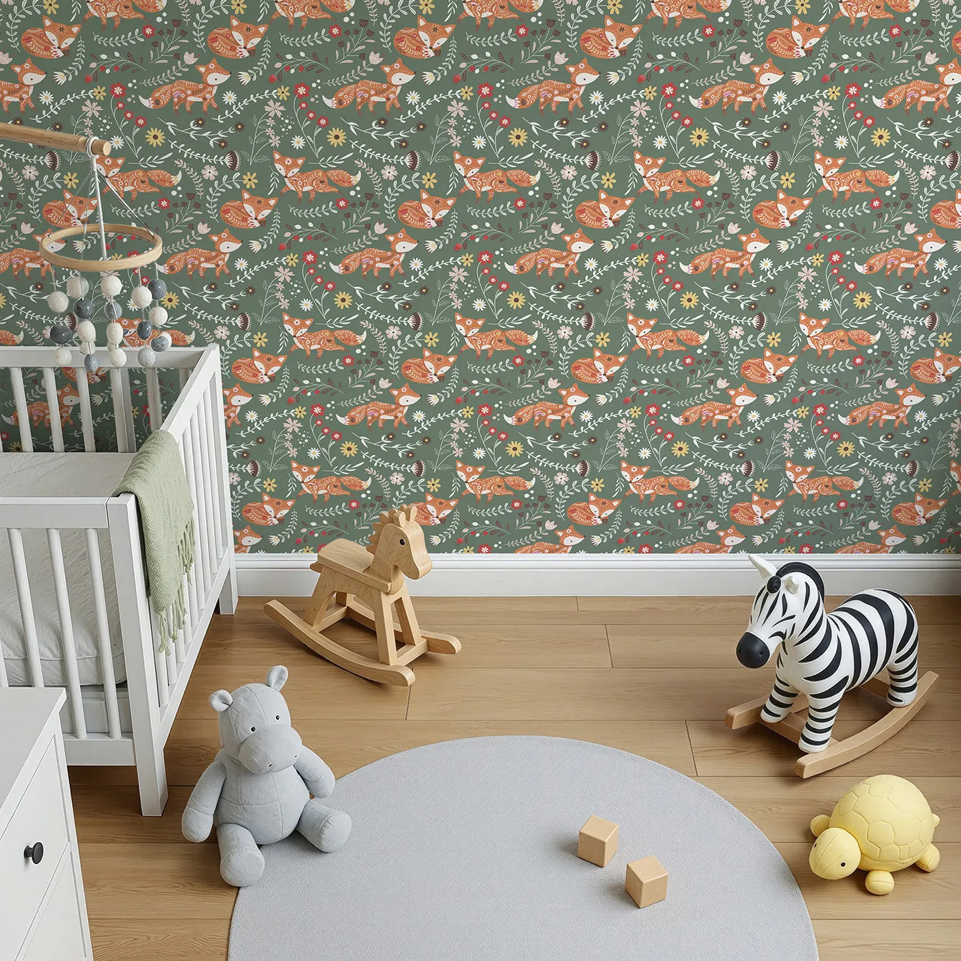 Top-Down view of Whimsy Tots' Folk Bloom Foxes Wallpaper in Forest Green (W3096C).Rust-orange foxes play and rest among leaves and blooms on a forest green field.