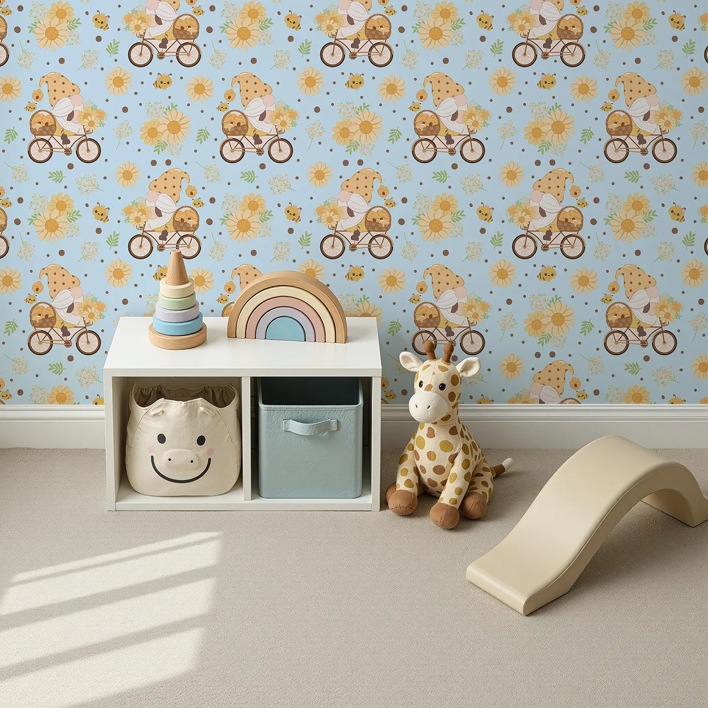 Top-Down view of Whimsy Tots' Honeybee Gnome Parade Wallpaper in Sky Blue (W3097D).A cheerful gnome pedals under blue skies with happy bees and sunny blossoms.