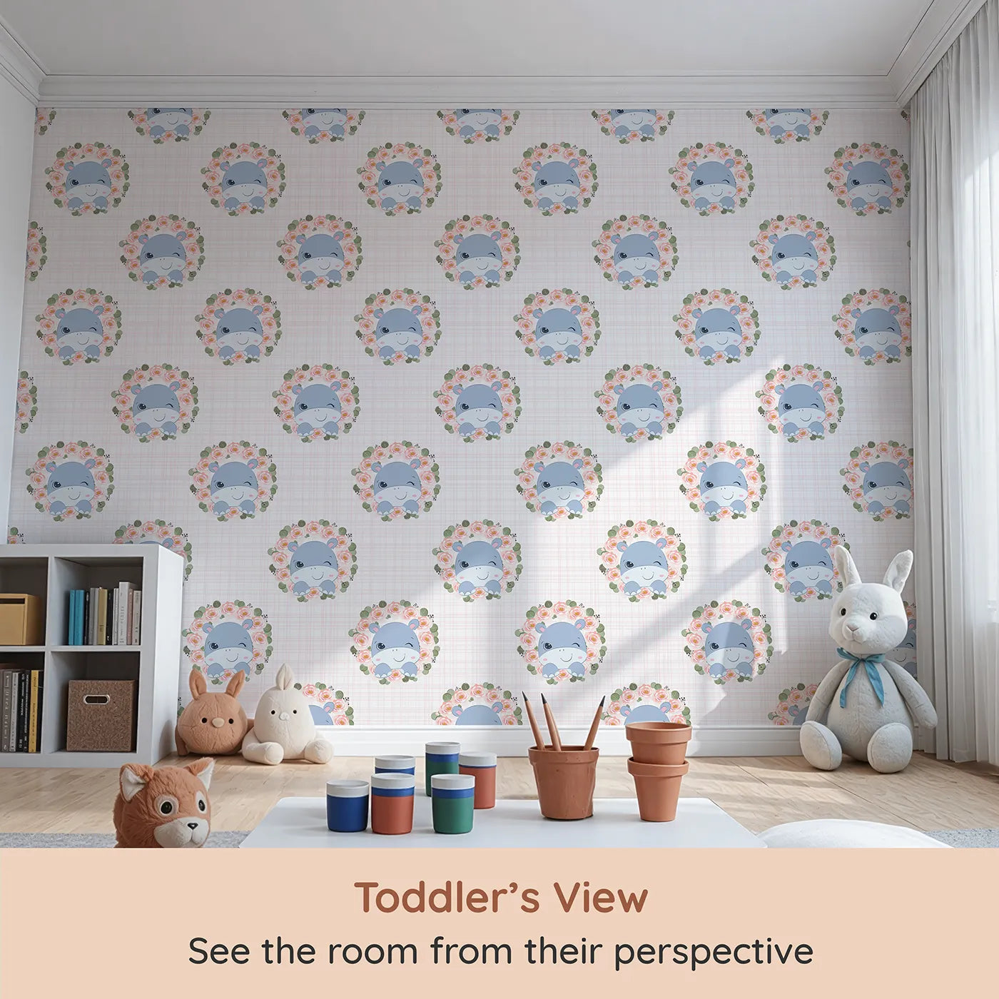 Whimsy Tots Blossom Hippo Winks Wallpaper in Pink Garden (W3103A) from your child's view.A sweet blue hippo peeks through rose wreaths with a wink and a giggle.