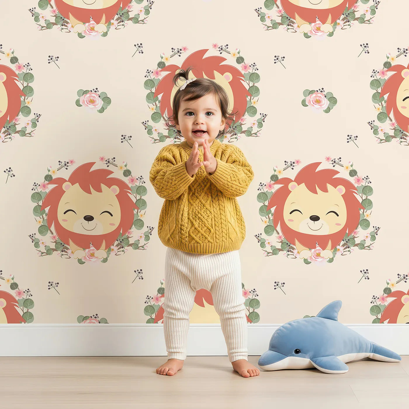 Lovely child standing in front of Whimsy Tots Little Lion Blossom Parade Wallpaper in Cream Delight with lion, flower, wreath, leaf, blossom in design.