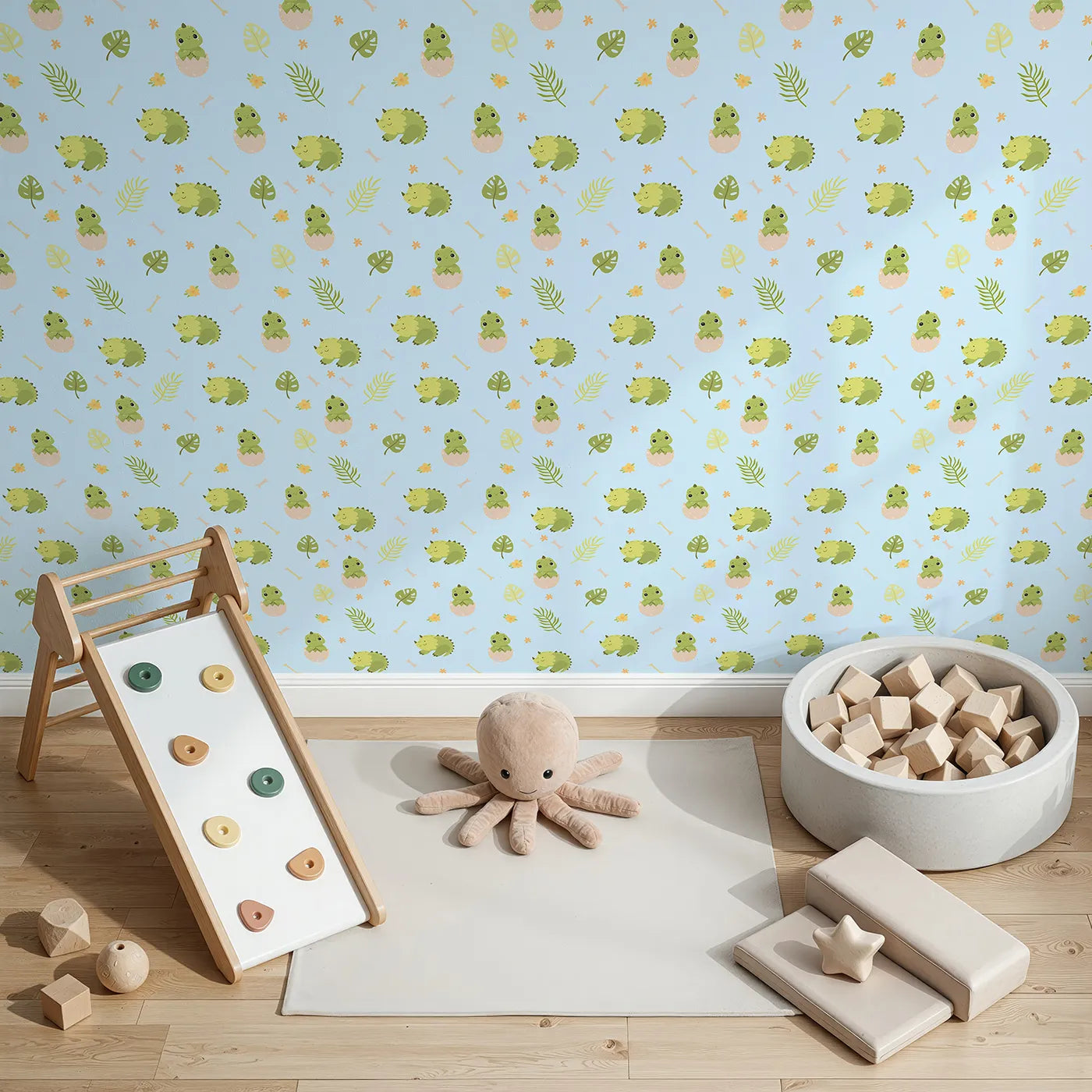 Top-Down view of Whimsy Tots' Hatching Dino Friends Wallpaper in Sky Blue (W3109D).Baby dinos and tropical leaves bring gentle joy to every blue corner.