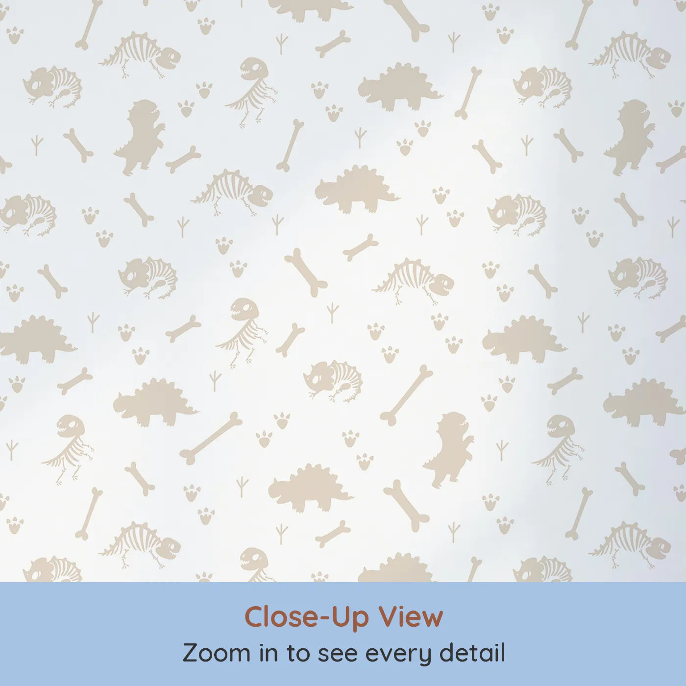 Close-up view of Whimsy Tots' Fossil Roar Parade Wallpaper in Soft Taupe Beige (W3110E).Gentle bones and dino tracks soften their world in warm taupe.