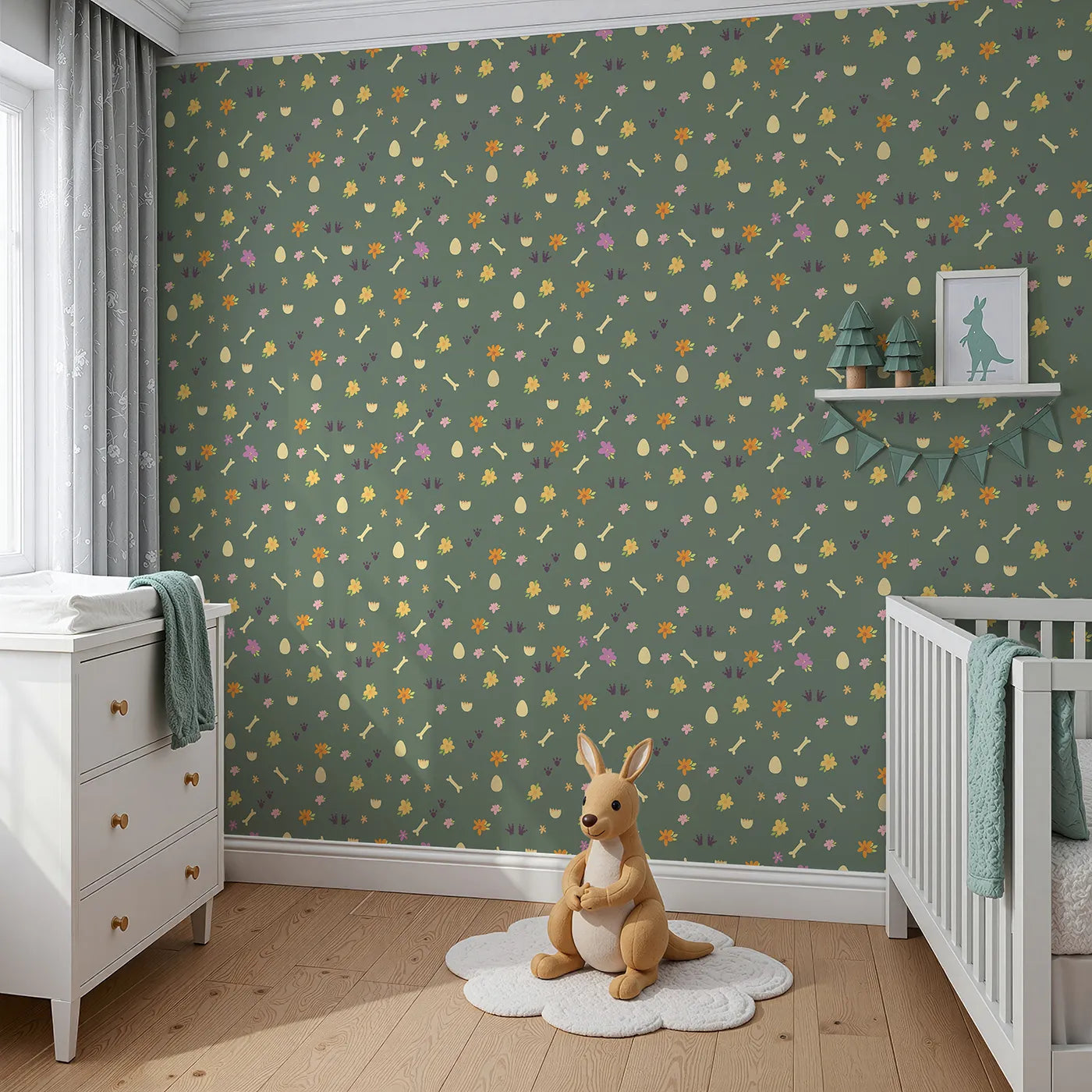 Angled view of Whimsy Tots' Dino Hatch Trail Wallpaper in Forest Fern Green (W3118C).Dino tracks and garden treasures hide across a soft green path.