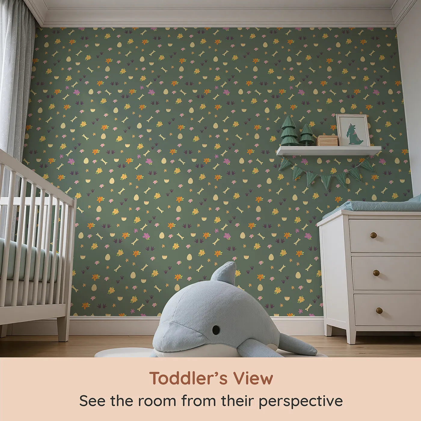 Whimsy Tots Dino Hatch Trail Wallpaper in Forest Fern Green (W3118C) from your child's view.Dino tracks and garden treasures hide across a soft green path.