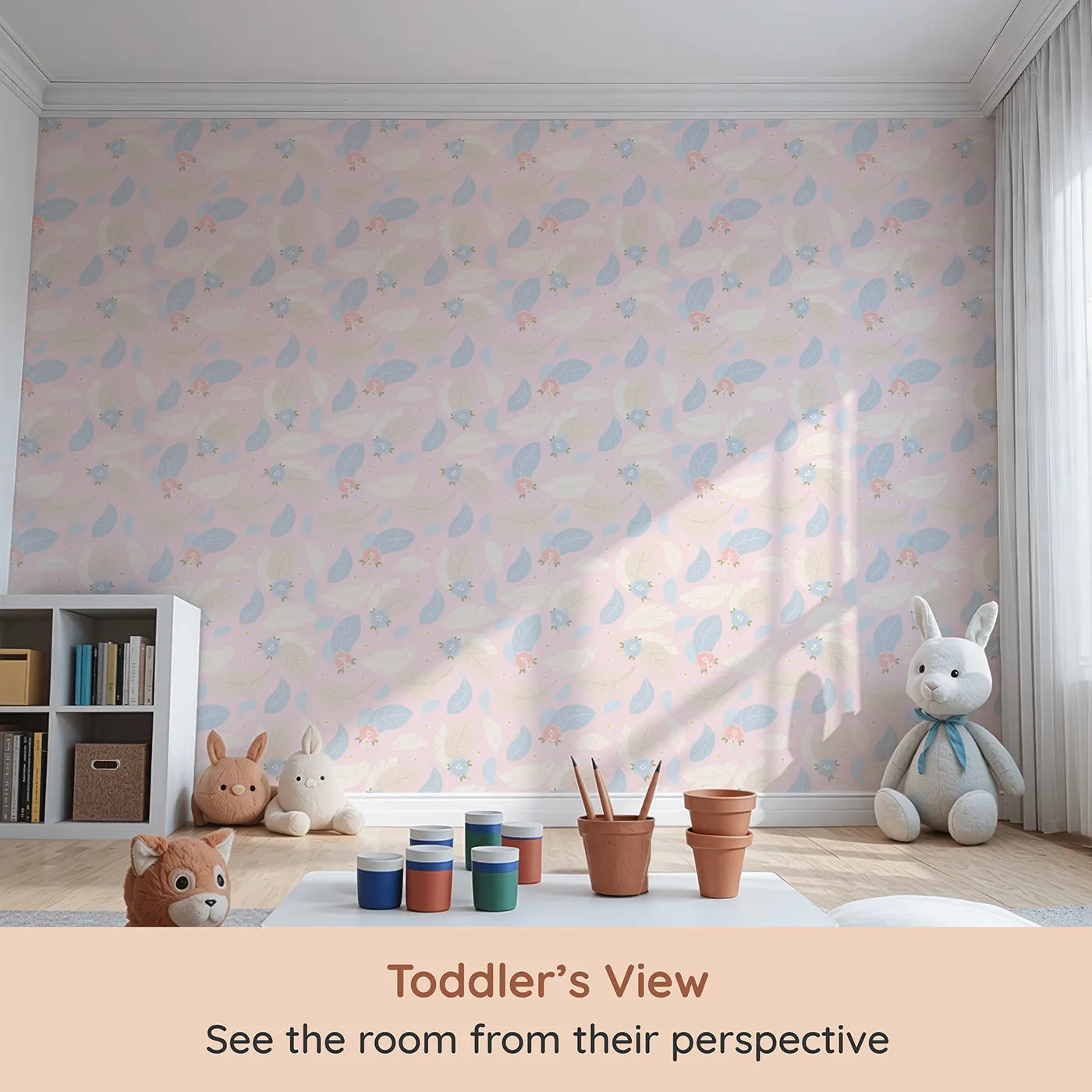 Whimsy Tots Whispering Petal Leaves Wallpaper in Blush Sky Pink (W3131B) from your child's view.Gentle leaves and airy florals dance across a warm pink sky.