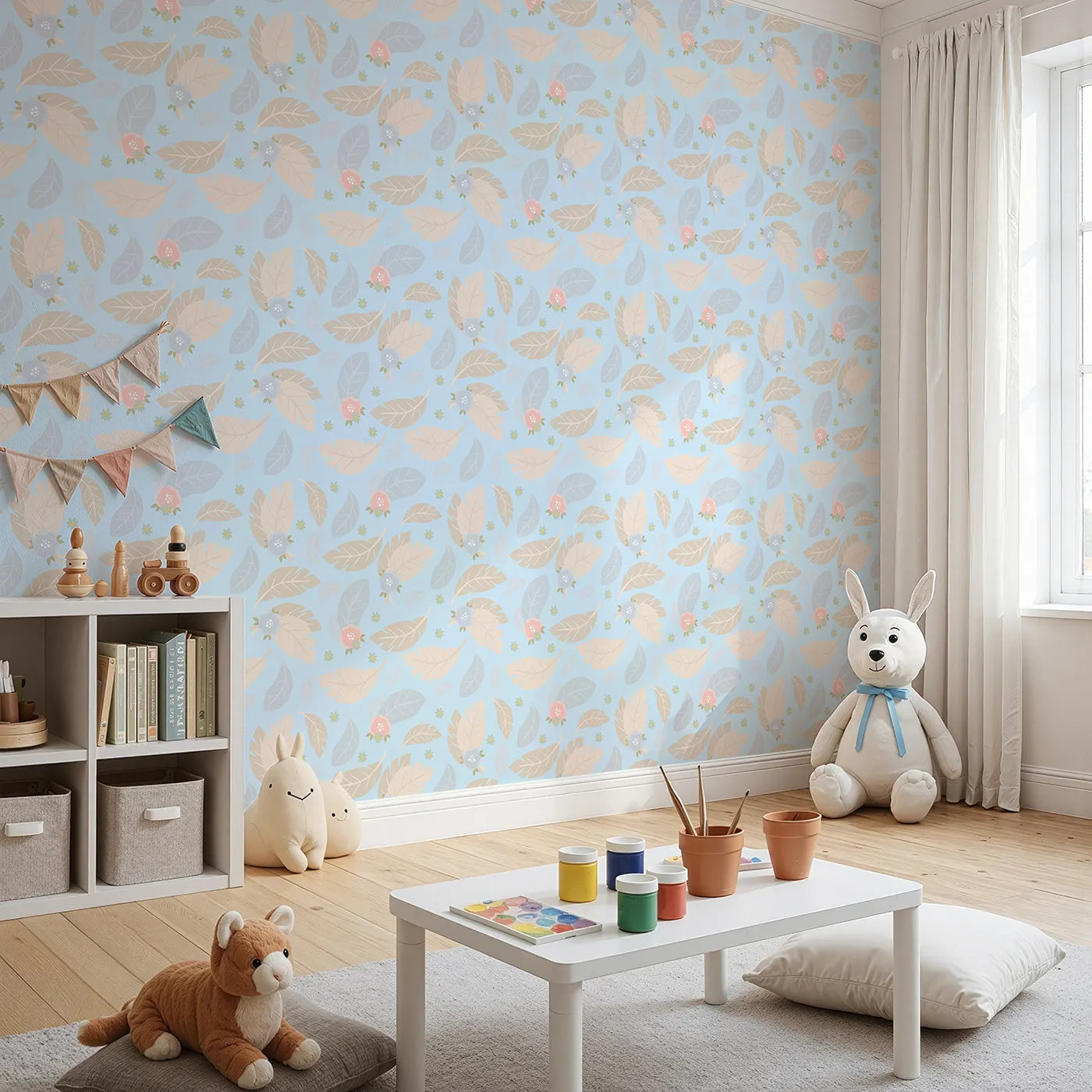 Angled view of Whimsy Tots' Whispering Petal Leaves Wallpaper in Sky Blue (W3131D).Floating florals and soft leaves drift on a pale blue breeze.