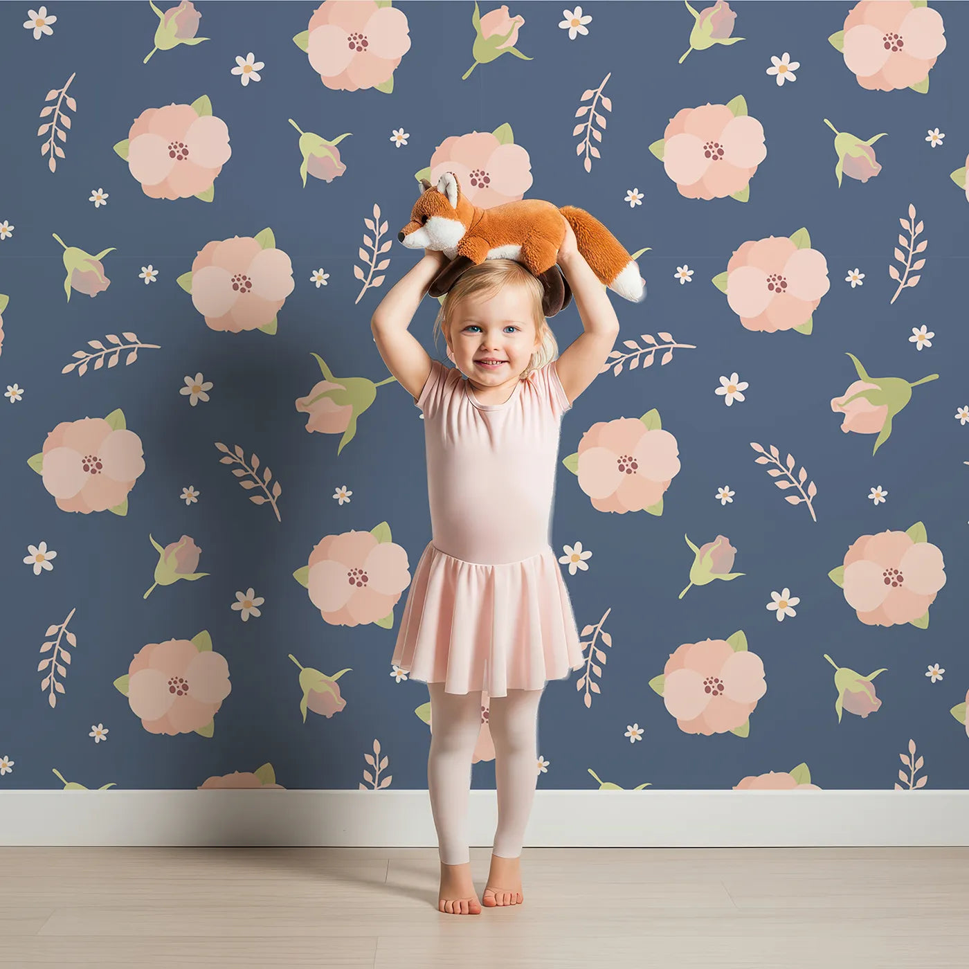 Lovely child standing in front of Whimsy Tots Blush Meadow Bloom Wallpaper in Midnight Blue with flower, daisy, leaf, petal in design.