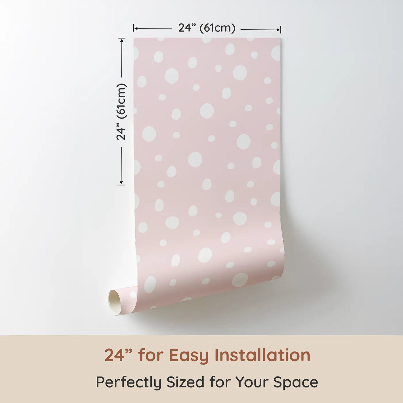 Dimension view of Whimsy Tots Gentle Pebble Dots Wallpaper in Blush Cream (W3136A). Printed in 24-inch-wide panel for easy installation. White pebbled dots dance across a warm blush-pink sky.