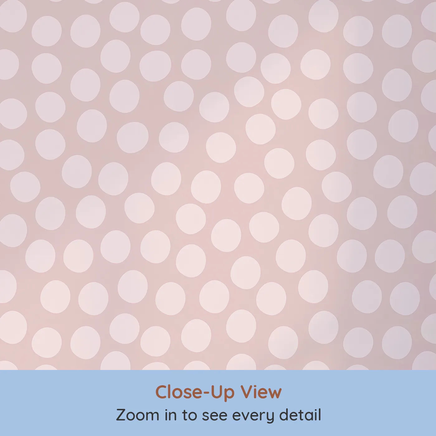 Close-up view of Whimsy Tots' Playful Pebble Dots Wallpaper in Blush Pink (W3142A).Soft pink ovals create a cozy rhythm across a rosy blush field.