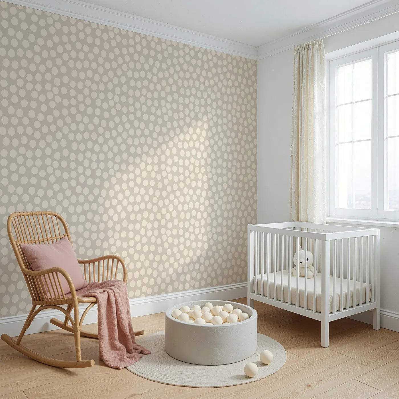 Angled view of Whimsy Tots' Playful Pebble Dots Wallpaper in Oat Beige (W3142B).Creamy dots dot across a gentle oat-colored canvas.