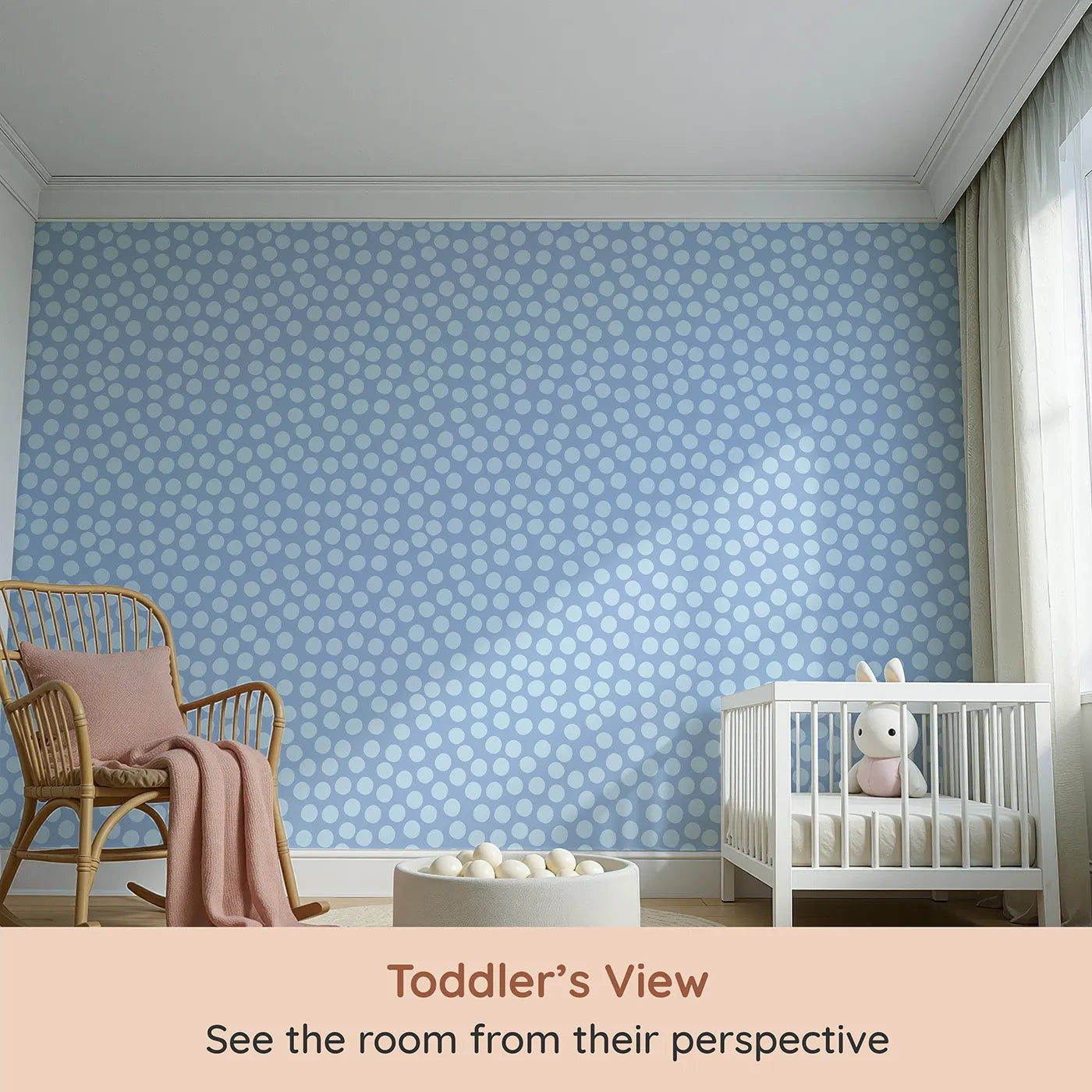 Whimsy Tots Playful Pebble Dots Wallpaper in Periwinkle Blue (W3142D) from your child's view.Dusty blue dots tumble playfully across a periwinkle-toned sky.