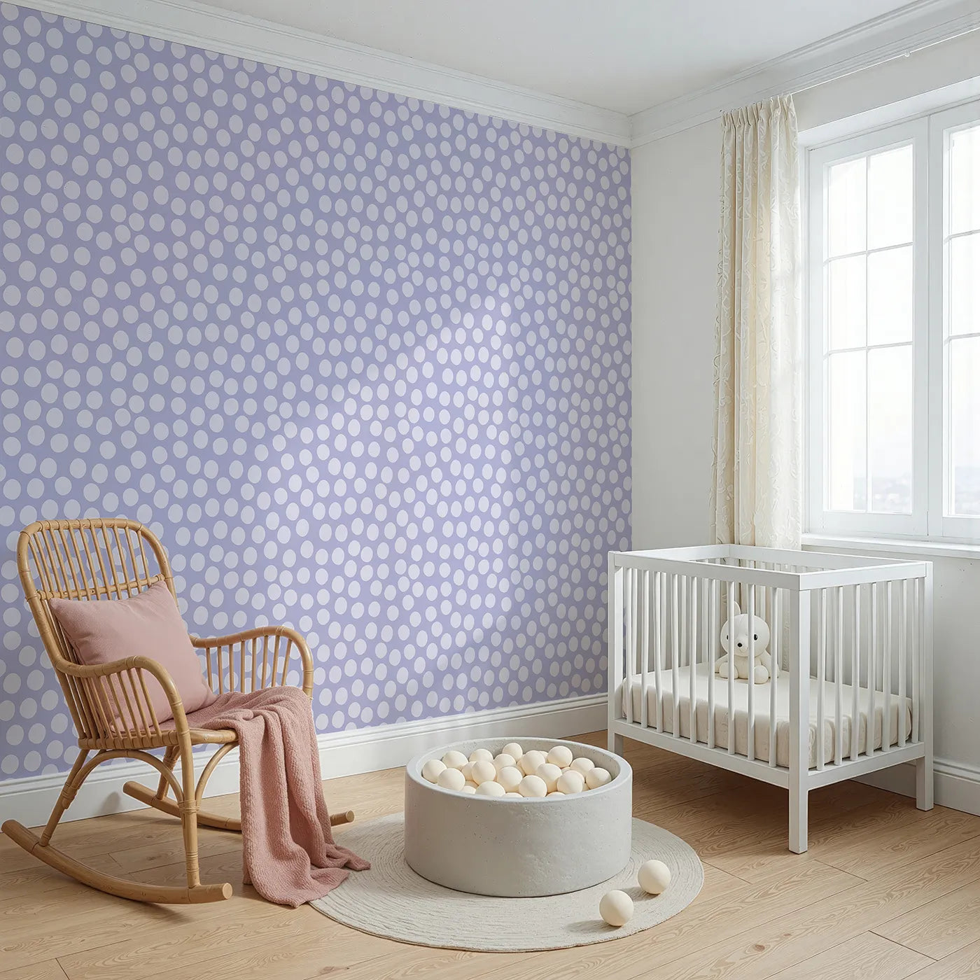 Angled view of Whimsy Tots' Playful Pebble Dots Wallpaper in Lavender Mist (W3142E).Soft lavender dots float gently across a dreamy lilac sky.