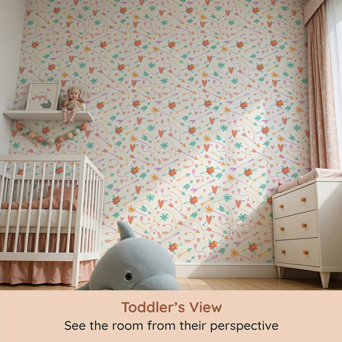 Whimsy Tots Love and Arrows Bloom Parade Wallpaper in Cream Blush (W3145A) from your child's view.Hearts, arrows, and blossoms dance across a soft cream sky.