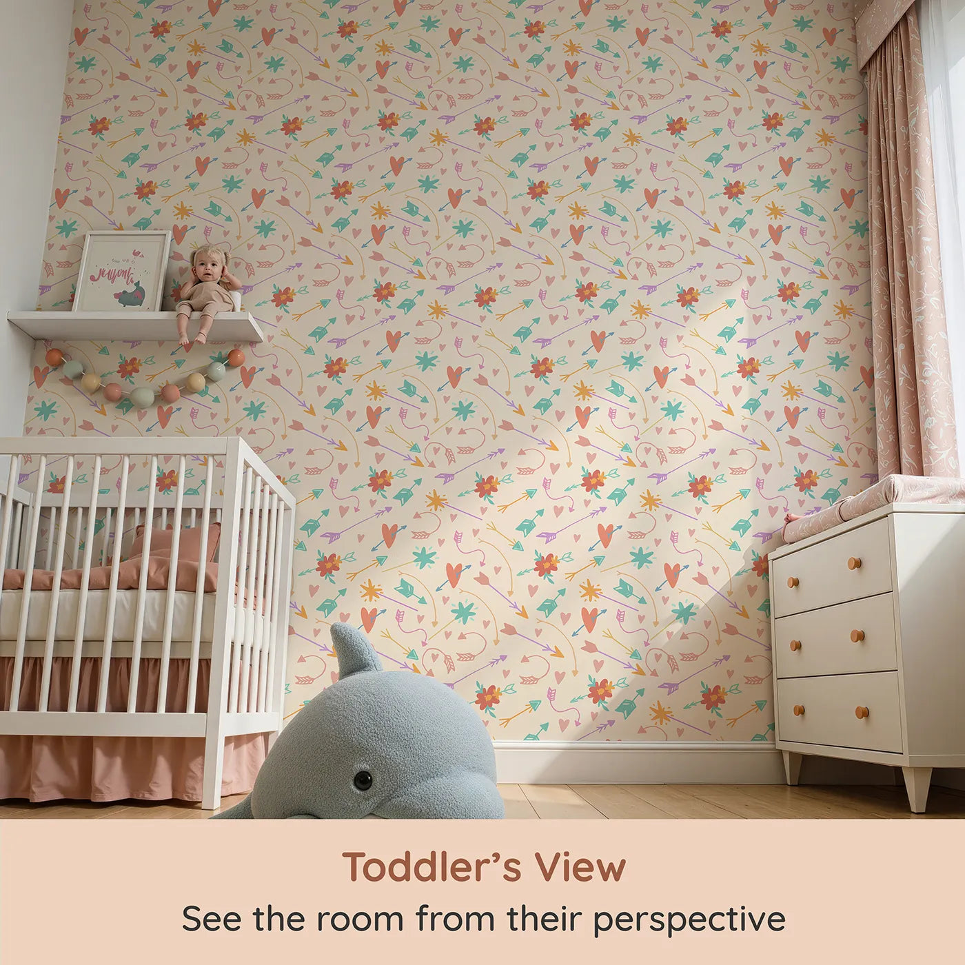 Whimsy Tots Love and Arrows Bloom Parade Wallpaper in Soft Peach (W3145C) from your child's view.Pastel arrows and blossoms dance across a gentle peachy field.