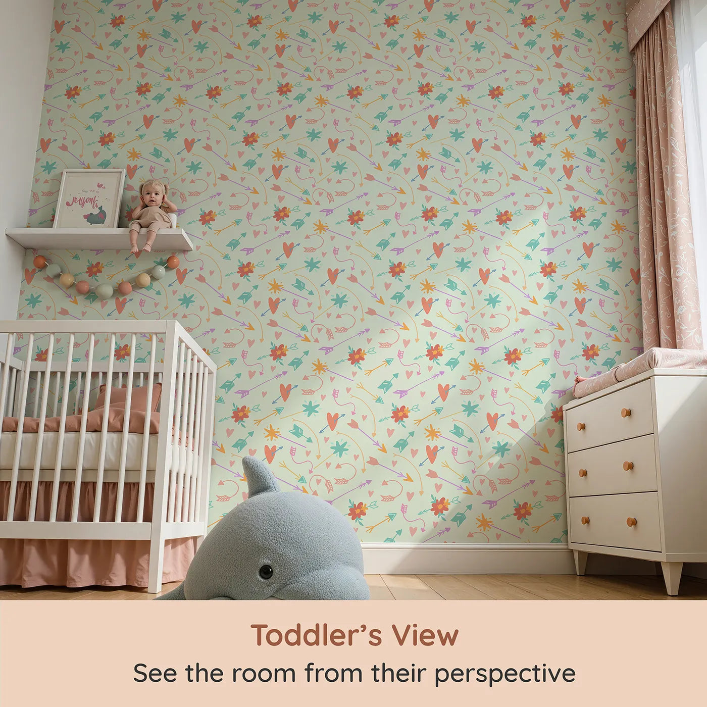 Whimsy Tots Love and Arrows Bloom Parade Wallpaper in Mint Green (W3145D) from your child's view.Blossoms and arrows float gently across a fresh minty green backdrop.