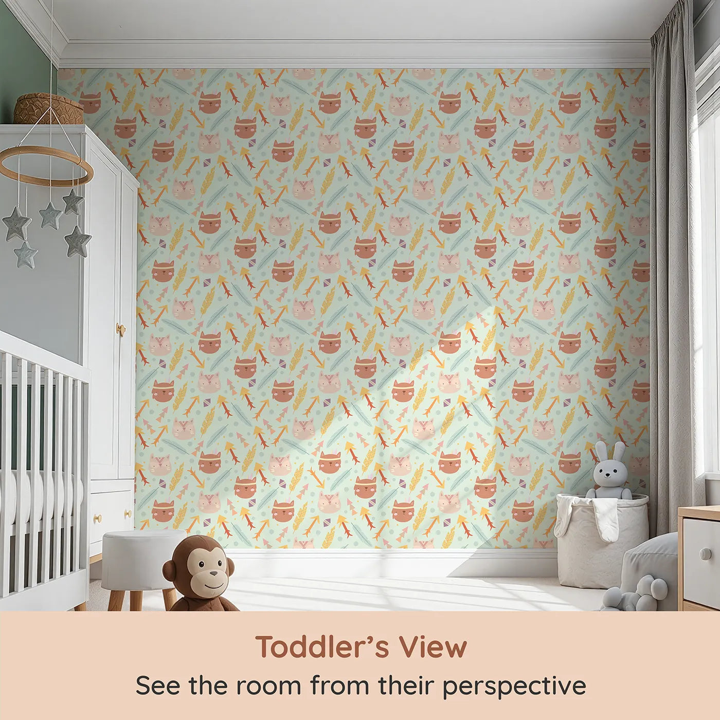 Whimsy Tots Tribal Kitten Parade Wallpaper in Soft Mint Green (W3148D) from your child's view.Kittens, feathers, and tribal arrows dance across a minty green sky.