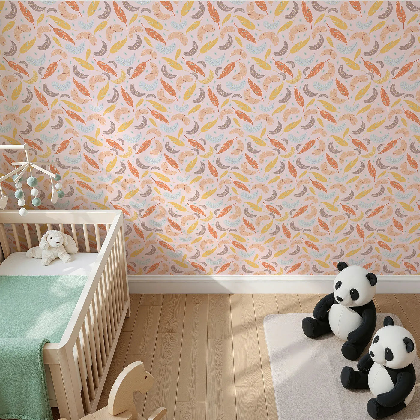Top-Down view of Whimsy Tots' Feathered Whimsy Drift Wallpaper in Petal Blush (W3151B).Colorful feathers swirl gently across a pink whisper sky.