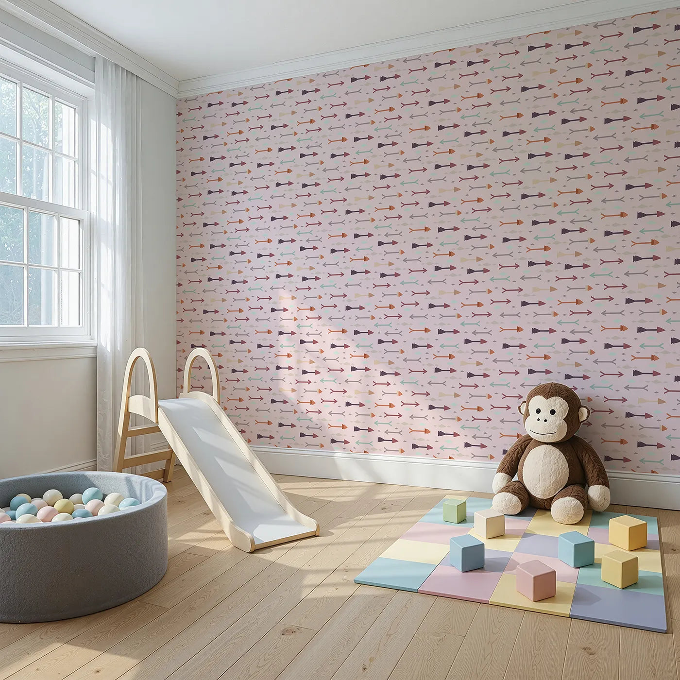 Angled view of Whimsy Tots' Boho Arrow Trail Wallpaper in Blush Pink (W3154B).Playful arrows and gentle diamonds drift across a blush pink field.