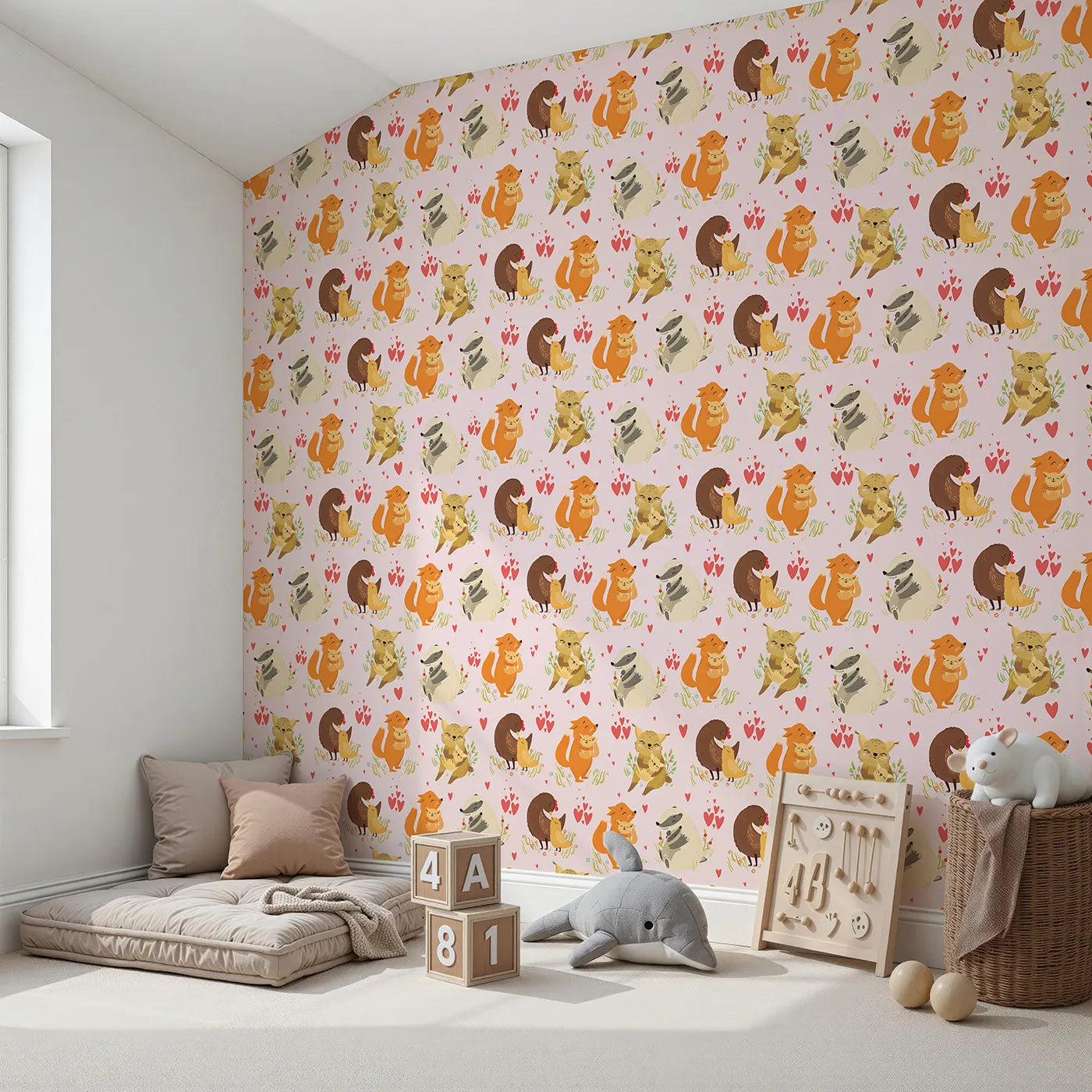 Angled view of Whimsy Tots' Cuddle Buddies Parade Wallpaper in Blush Pink (W3157B).Loving animal pairs share gentle cuddles across a pink field of joy.