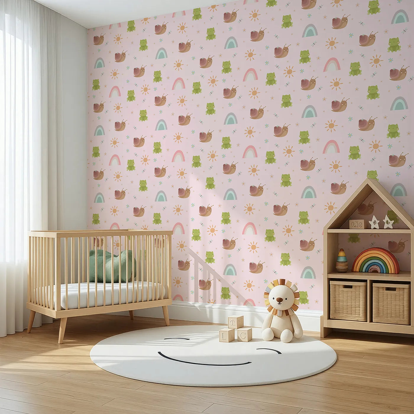 Angled view of Whimsy Tots' Garden Hop and Snail Trail Wallpaper in Blush Pink (W3163B).Cheerful frogs and snails wiggle gently across a blushing garden of smiles.