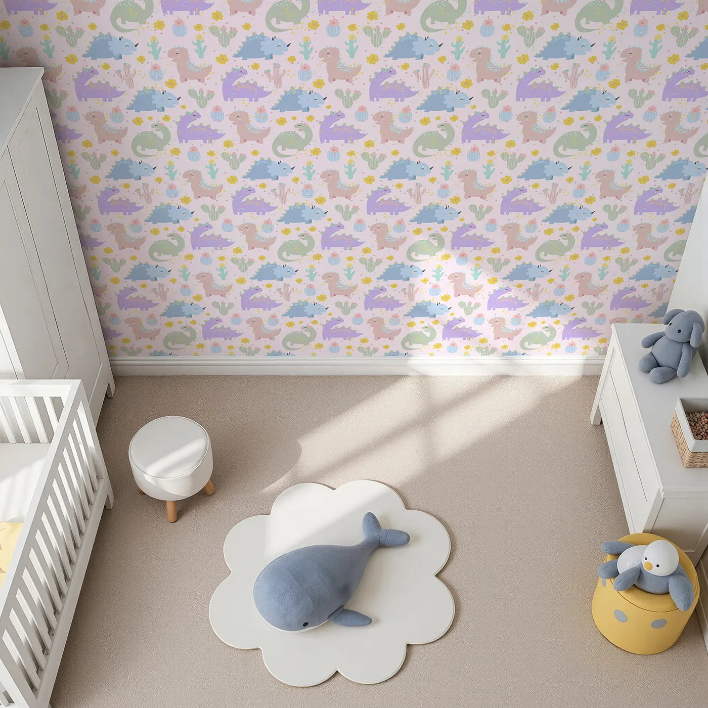 Top-Down view of Whimsy Tots' Cactus Dino Parade Wallpaper in Blush Pink (W3169B).Pastel dinos and blooming cacti play softly on a blush pink sky.