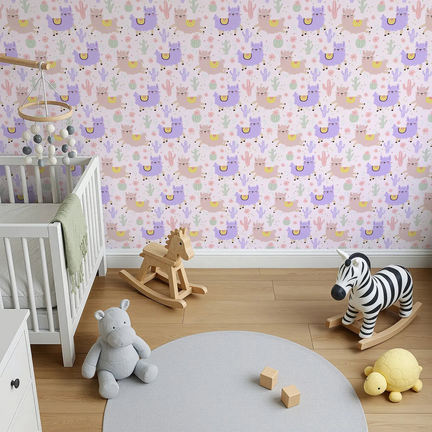 Top-Down view of Whimsy Tots' Bouncing Llama Fiesta Wallpaper in Pink Blush (W3174B).Smiling llamas and playful cactus pals fill the air with fiesta fun.
