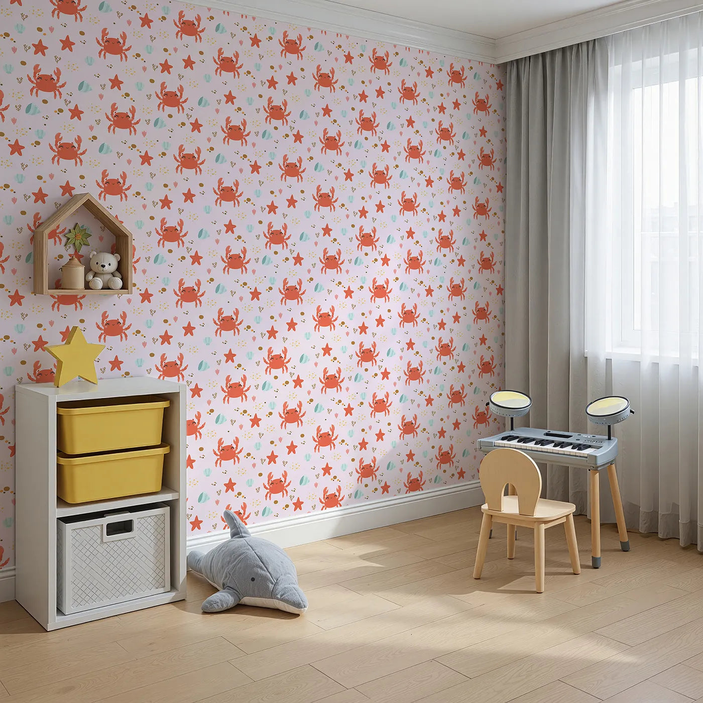 Angled view of Whimsy Tots' Crabby Coral Dance Wallpaper in Blush Pink (W3190B).Smiley crabs and playful starfish create a sunny undersea celebration.
