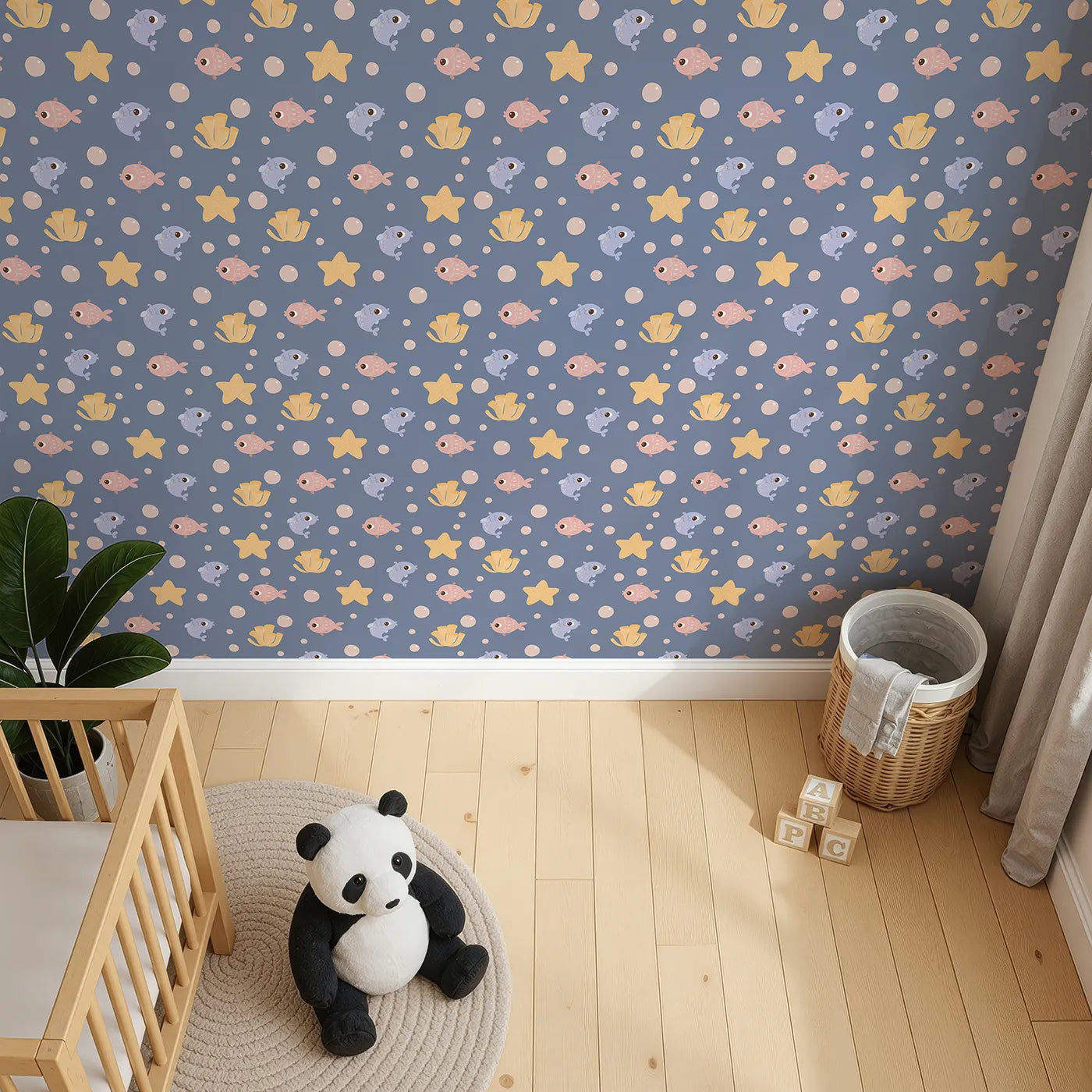 Top-Down view of Whimsy Tots' Bubblefish Coral Drift Wallpaper in Twilight Blue (W3193A).Smiley fish, coral tubes, and sea stars drift softly through bubble-filled seas.