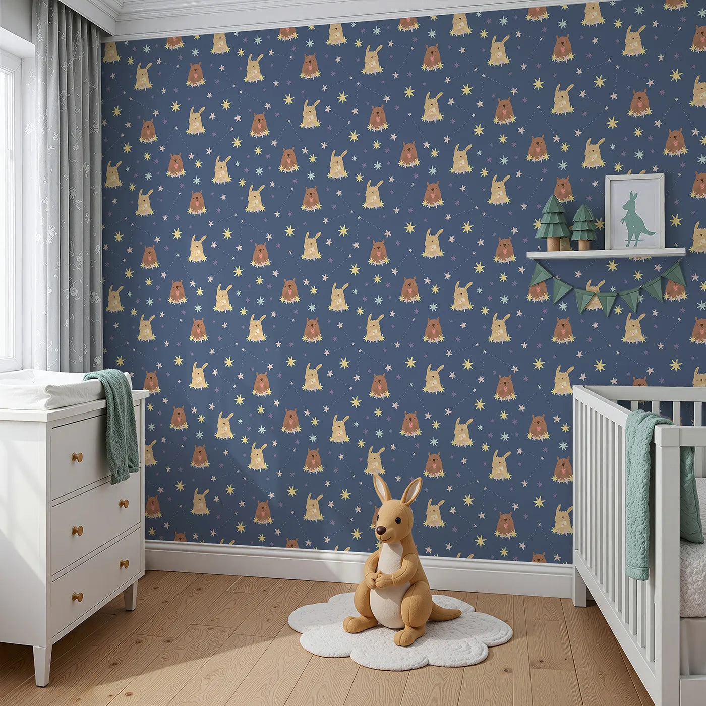 Angled view of Whimsy Tots' Starry Snuggle Pals Wallpaper in Navy Blue (W3196B).Sweet woodland friends rest among glowing constellations and soft starbursts.