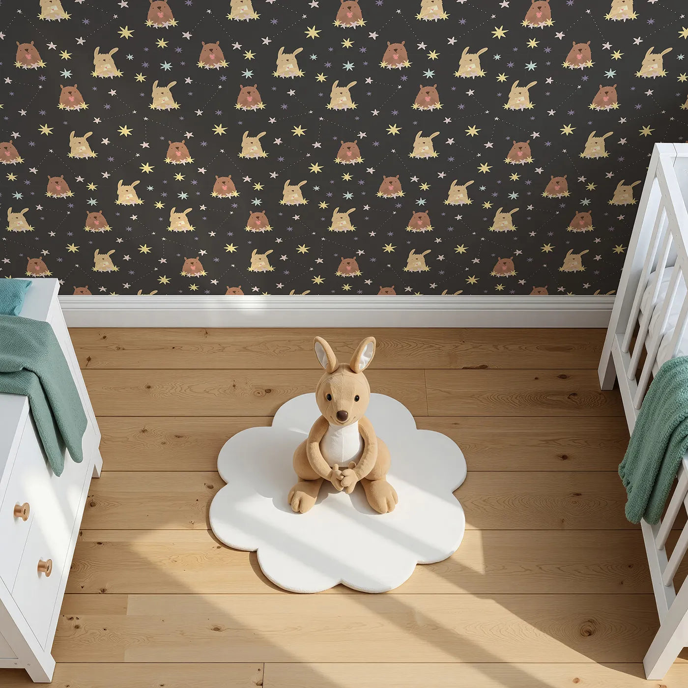 Top-Down view of Whimsy Tots' Starry Snuggle Pals Wallpaper in Charcoal Gray (W3196C).Sweet woodland friends rest among glowing constellations and soft starbursts.