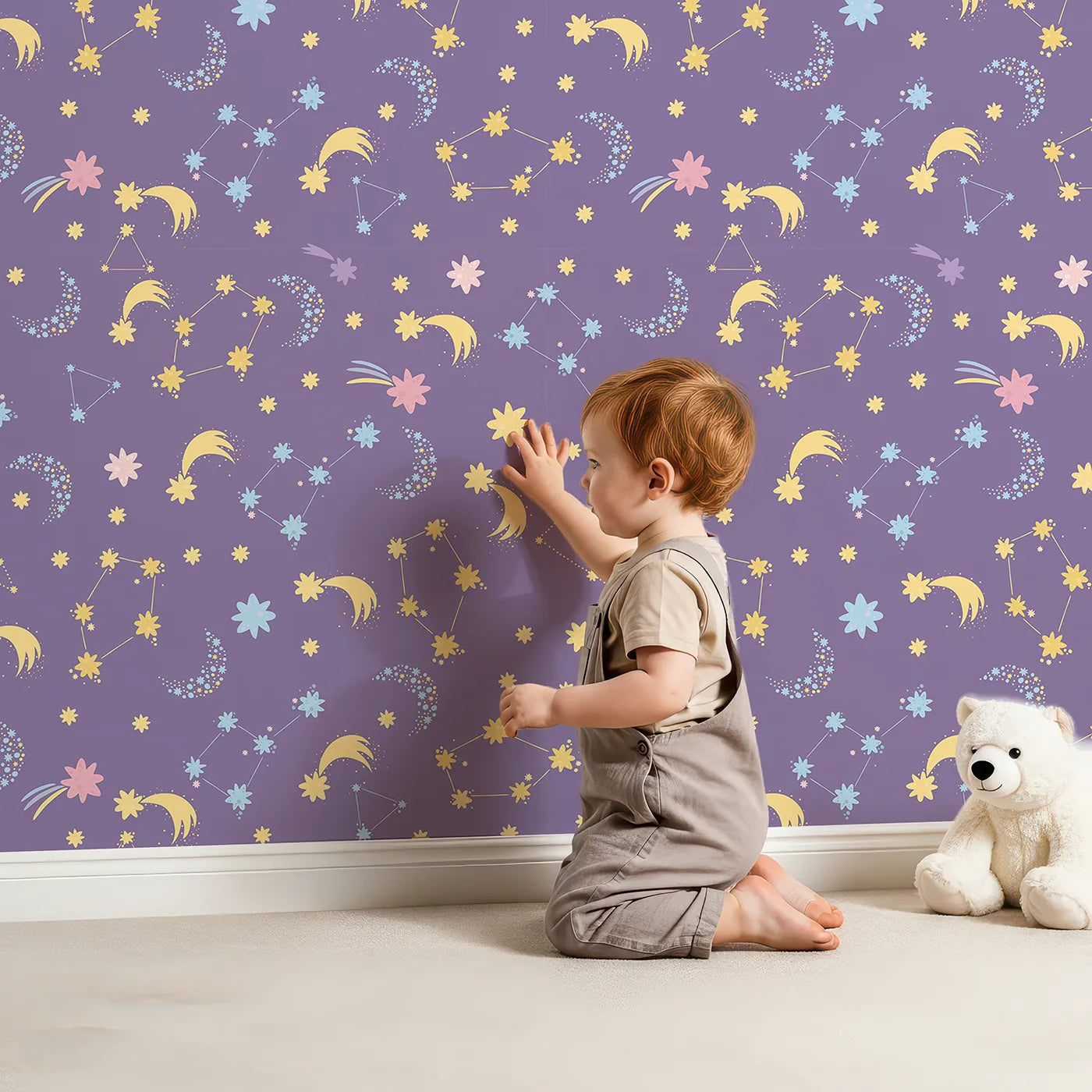 Lovely child standing in front of Whimsy Tots Starglow Constellation Dance Wallpaper in Plum with moon, star, constellation, shooting star, galaxy in design.