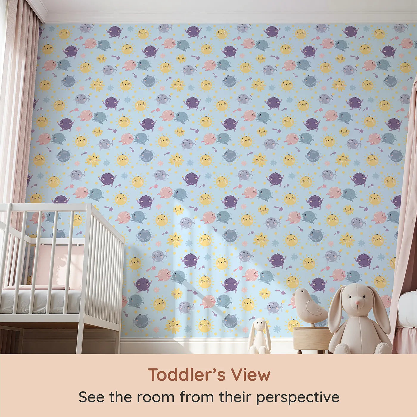 Whimsy Tots Planet Pals Orbit Parade Wallpaper in Sky Blue (W3199D) from your child's view.Dancing planets, smiling suns, and pastel comets twirl in a joyful galaxy.