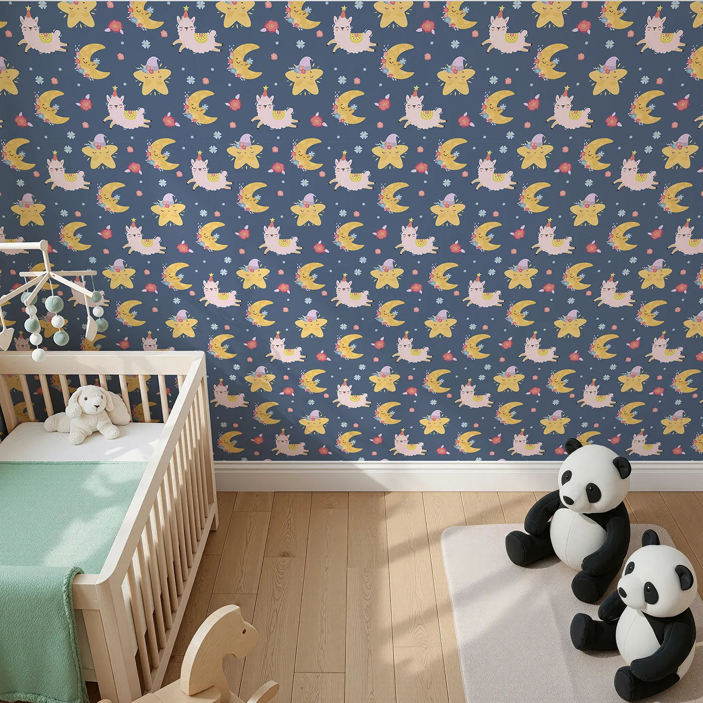 Top-Down view of Whimsy Tots' Llama Moon Parade Wallpaper in Soft Night Blue (W3201B).Sweet llamas and twinkling moons float across a peaceful night sky.