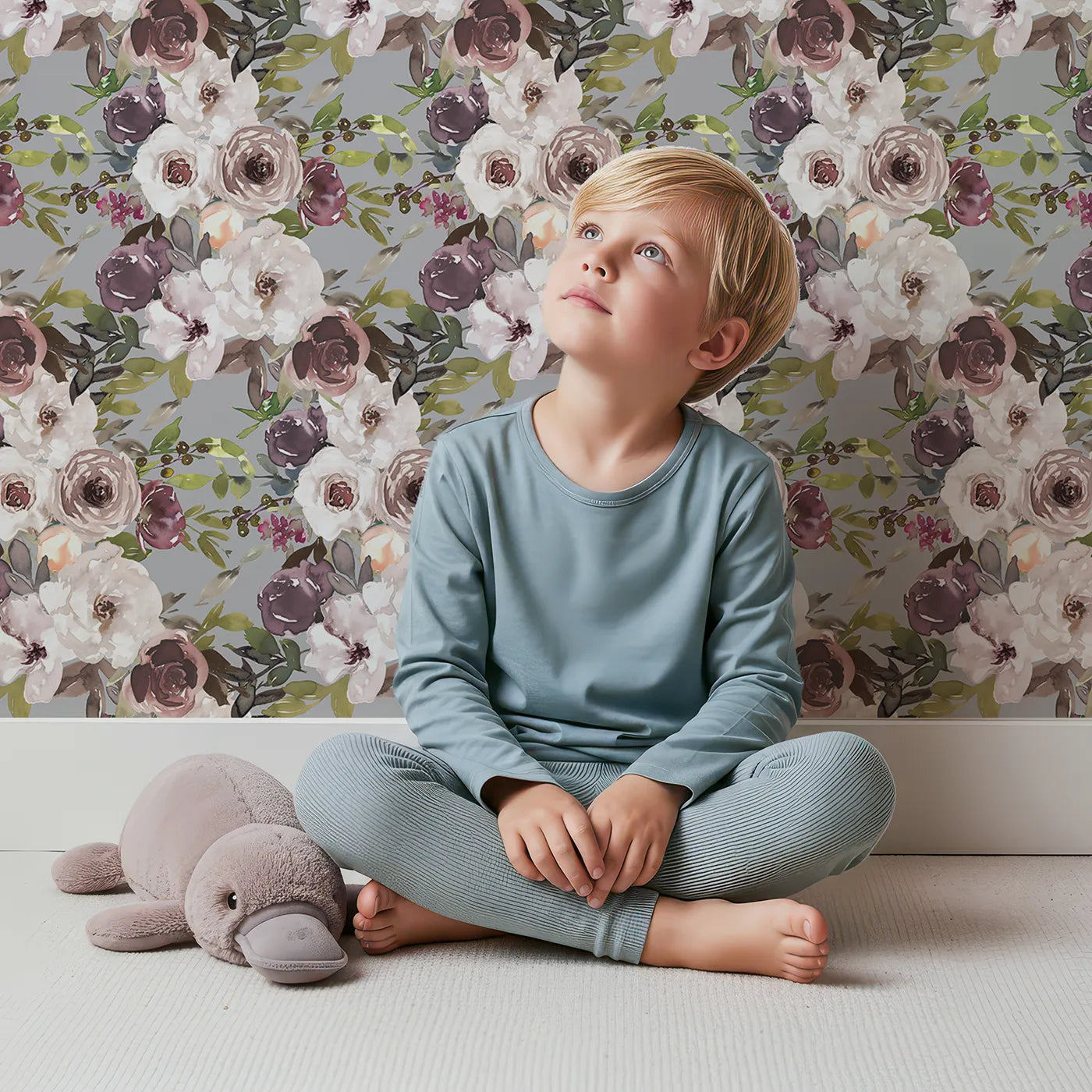 Lovely child standing in front of Whimsy Tots Autumn Heirloom Roses Wallpaper with rose, flower, leaf, bloom in design.