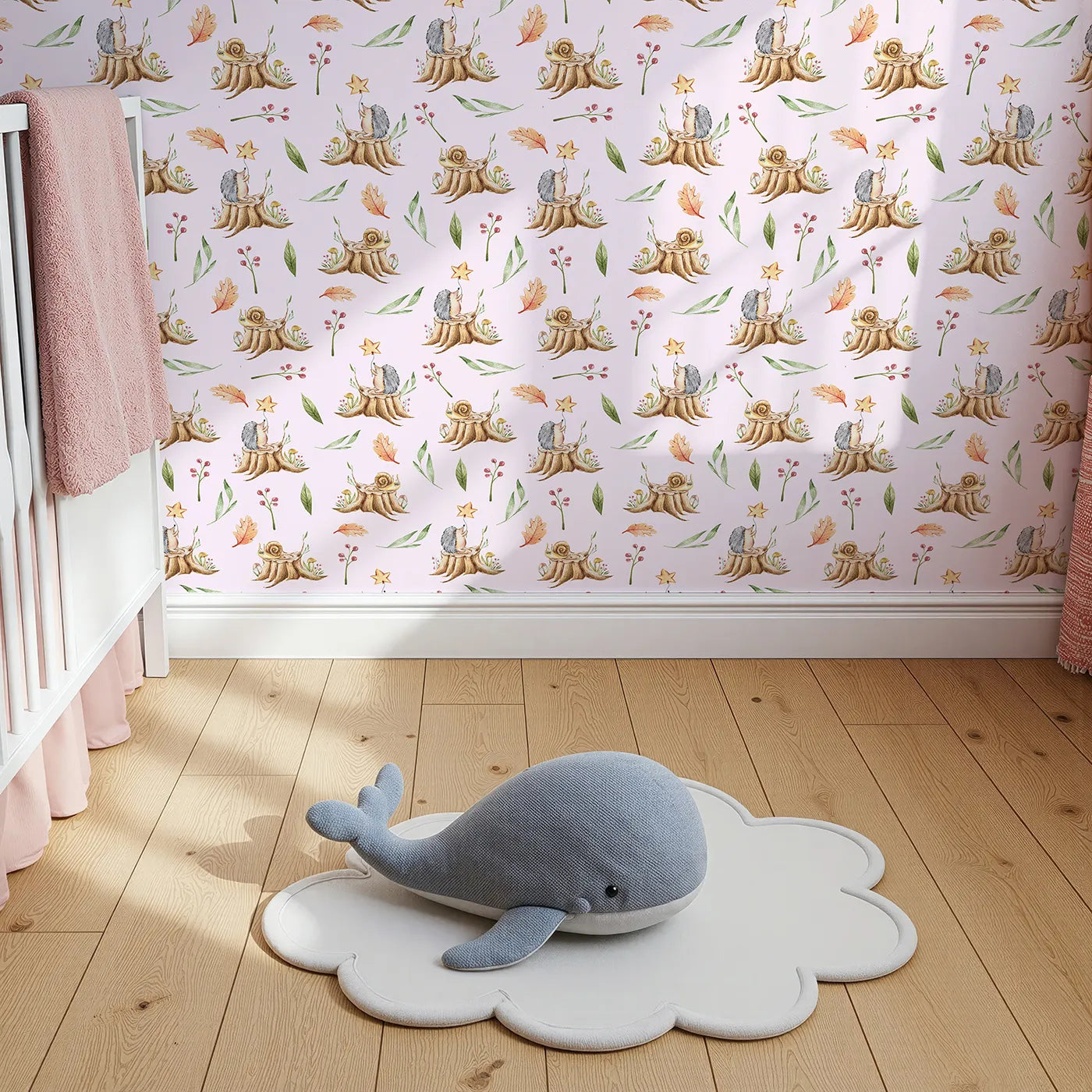 Top-Down view of Whimsy Tots' Forest Stump Snuggle Wallpaper in Blush Pink (W3251B).Snails and hedgehogs perch on tree stumps, wrapped in autumn leaves and soft forest light.