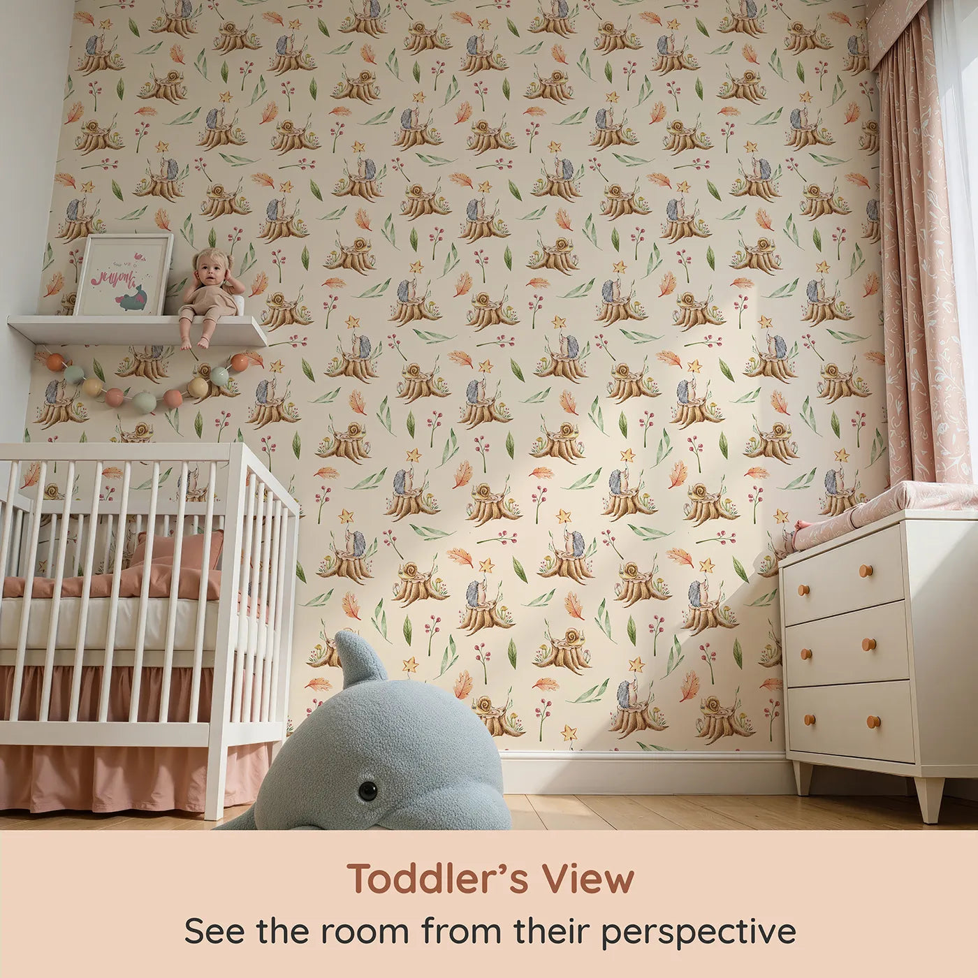 Whimsy Tots Forest Stump Snuggle Wallpaper in Cream (W3251C) from your child's view.Snails and hedgehogs perch on tree stumps, wrapped in autumn leaves and soft forest light.