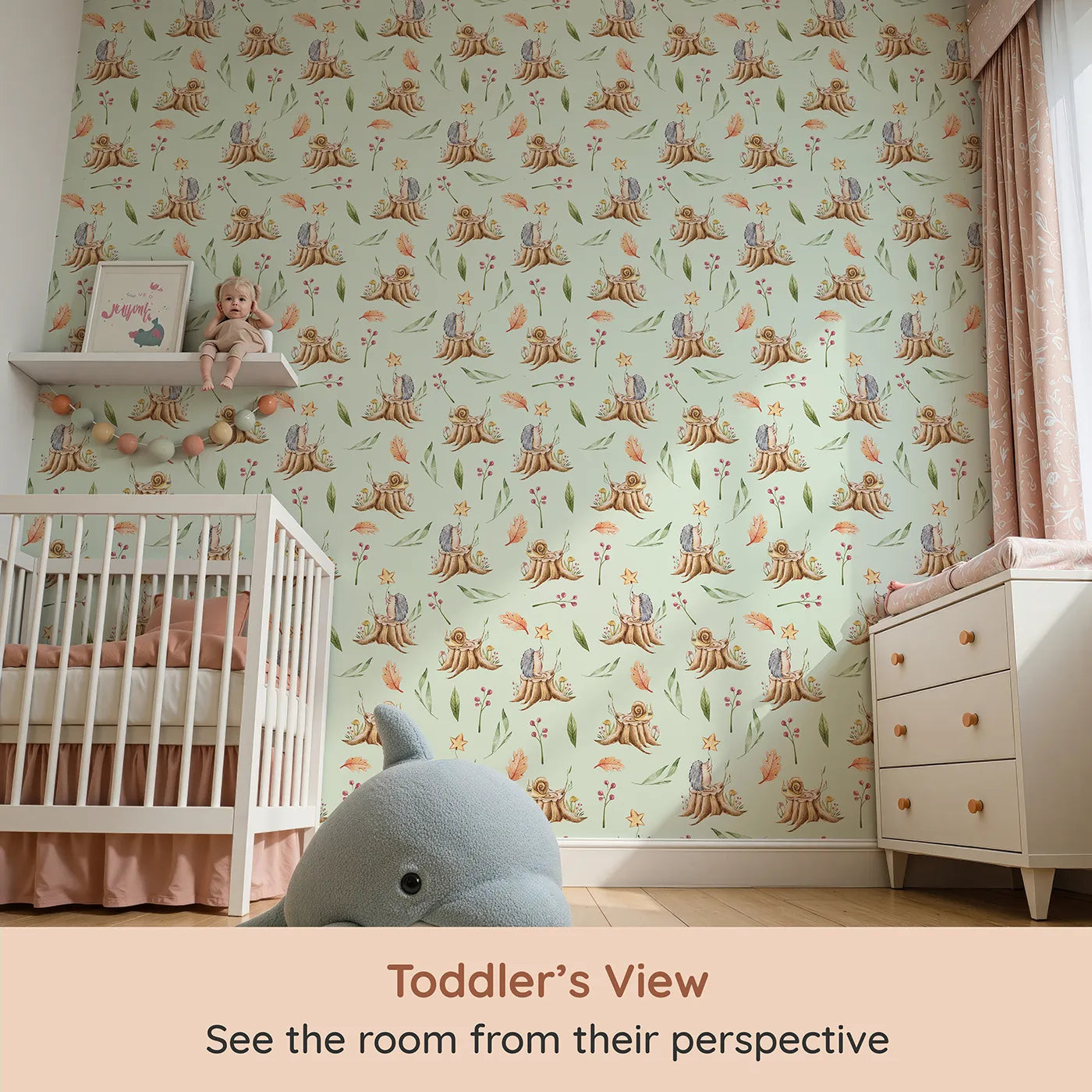 Whimsy Tots Forest Stump Snuggle Wallpaper in Green (W3251D) from your child's view.Snails and hedgehogs perch on tree stumps, wrapped in autumn leaves and soft forest light.