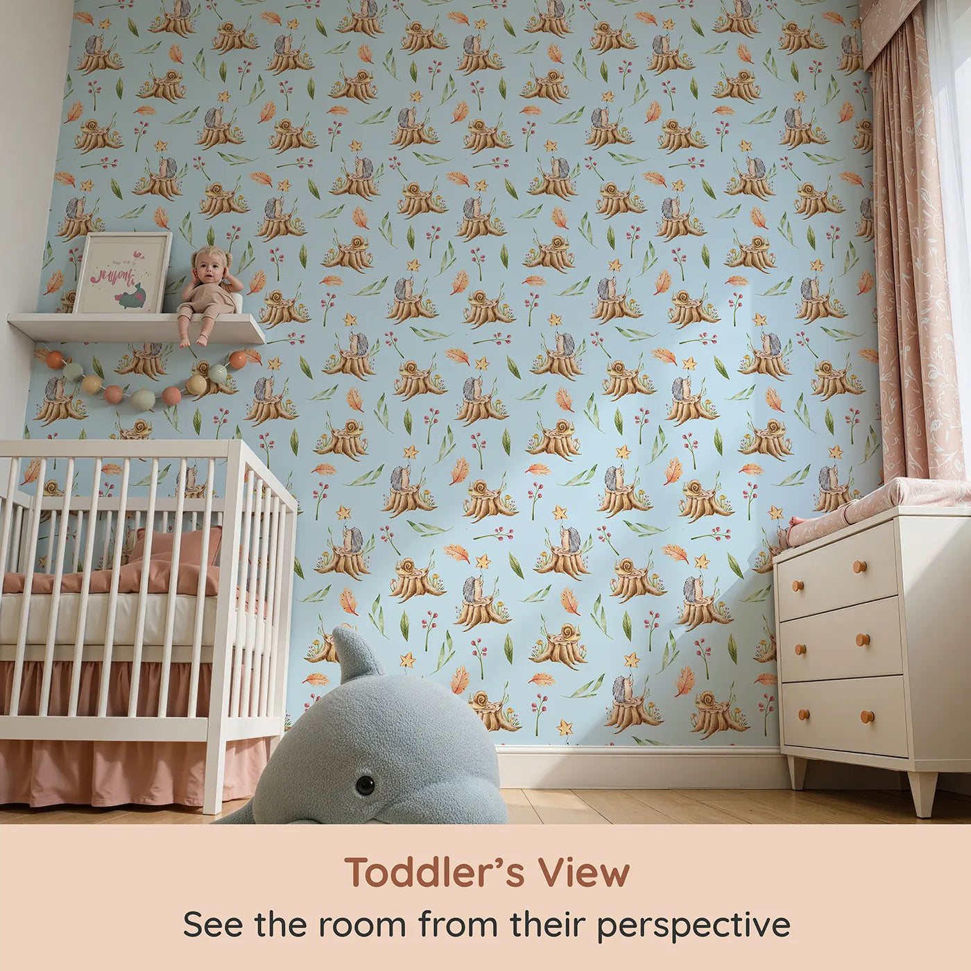 Whimsy Tots Forest Stump Snuggle Wallpaper in Blue (W3251E) from your child's view.Snails and hedgehogs perch on tree stumps, wrapped in autumn leaves and soft forest light.