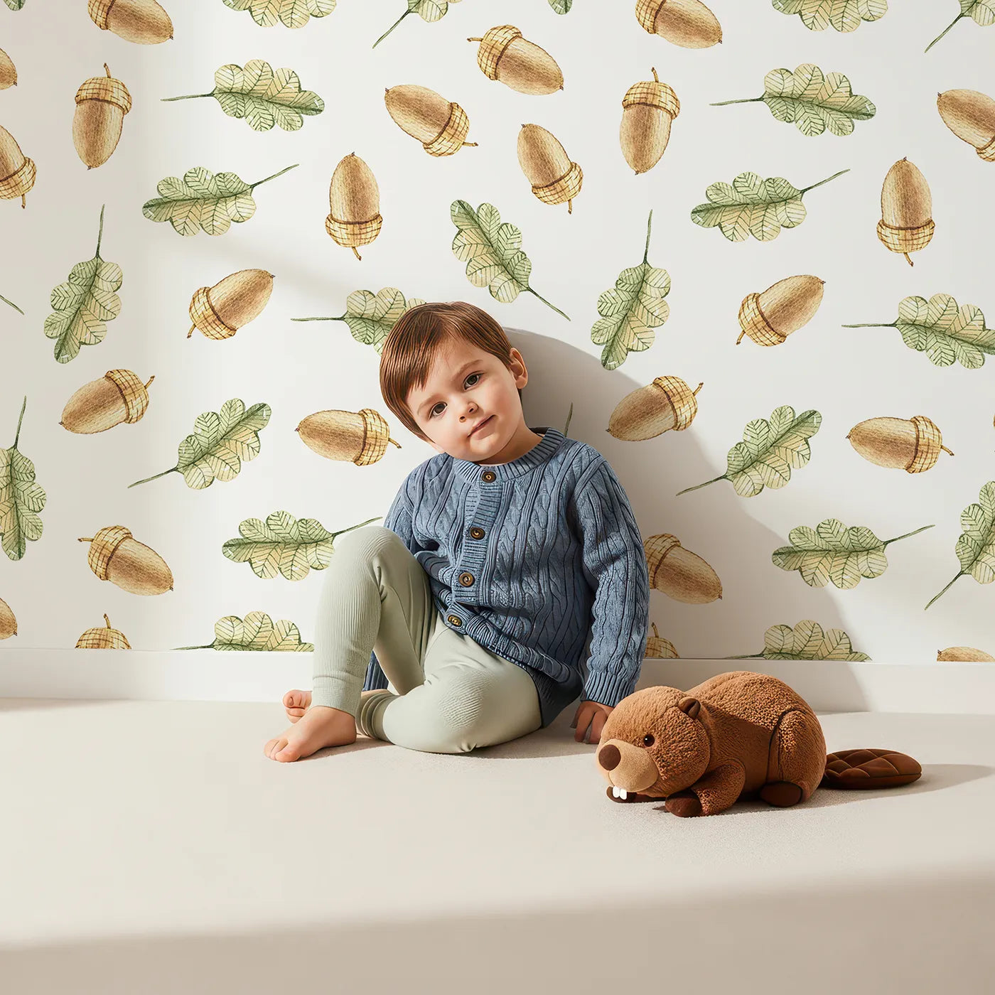 Lovely child standing in front of Whimsy Tots Acorn Meadow Whimsy Wallpaper in White with acorn, oak leaf, leaf in design.