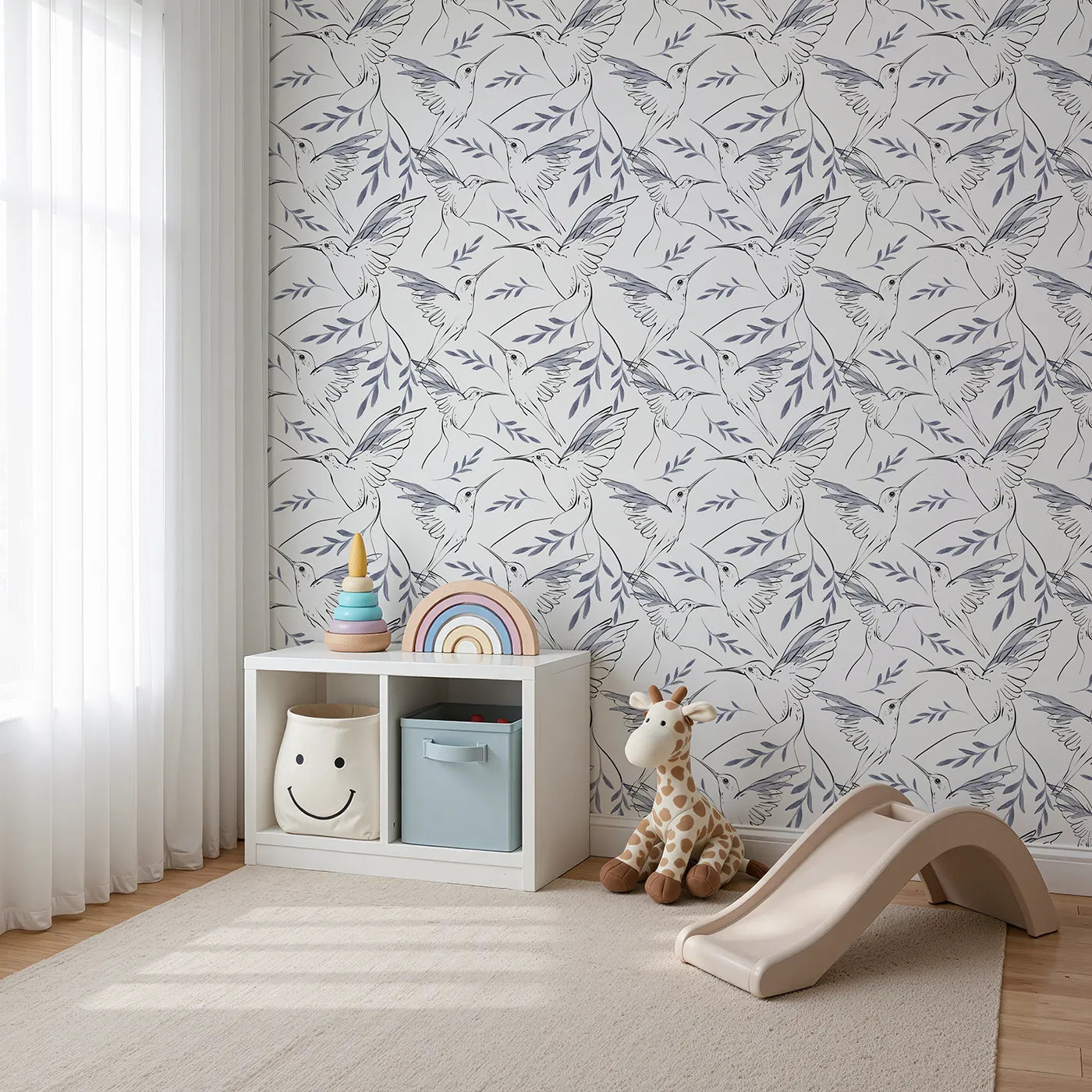 Angled view of Whimsy Tots' Hummingbird Line Dance Wallpaper in Ink Leaf (W3259).Delicate hummingbirds flutter among leafy wisps and open skies.