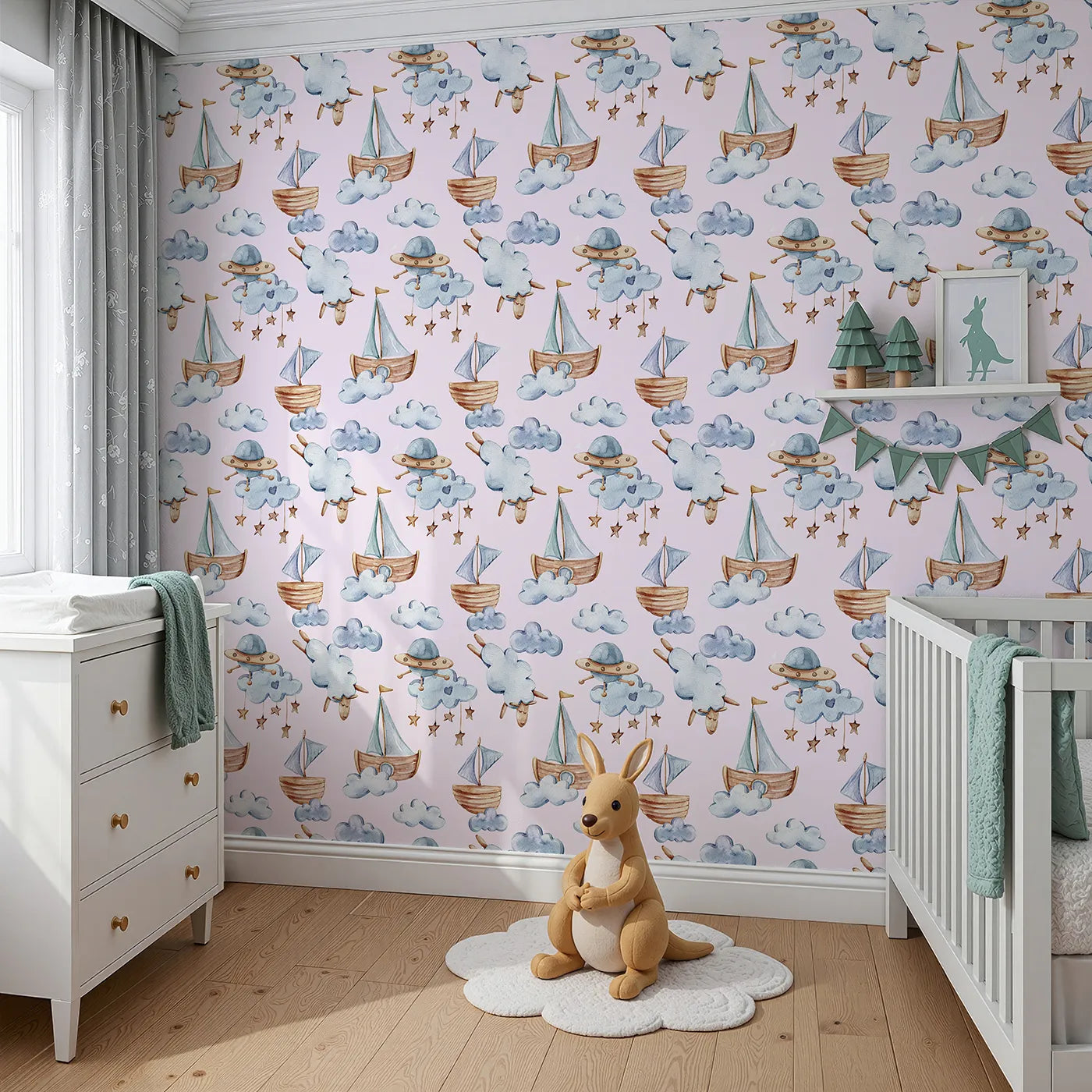 Angled view of Whimsy Tots' Cloud Sailor Dreams Wallpaper in Blush Pink (W3280B).Wooden boats and dreamy sheep drift across a blush-pink sky full of stars.