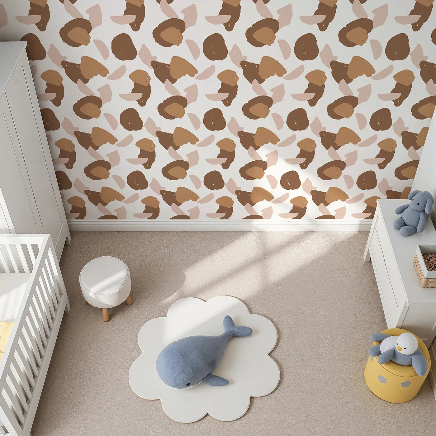 Top-Down view of Whimsy Tots' Desert Pebble Scatter Wallpaper (W3309).Rounded abstract pebbles in desert hues dance across the wall.
