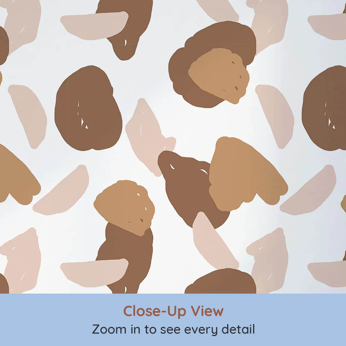 Close-up view of Whimsy Tots' Desert Pebble Scatter Wallpaper (W3309).Rounded abstract pebbles in desert hues dance across the wall.