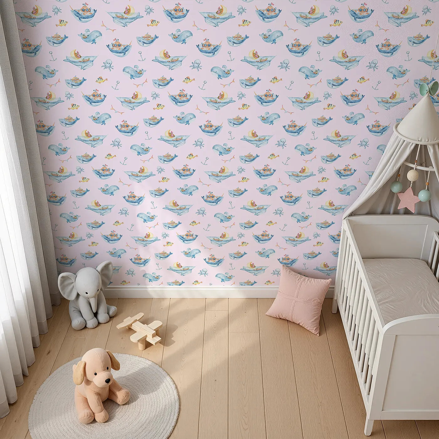 Top-Down view of Whimsy Tots' Whale Submarine Adventure Wallpaper in Blush Pink (W3312B).Whales and submarines sail young minds toward endless stories.